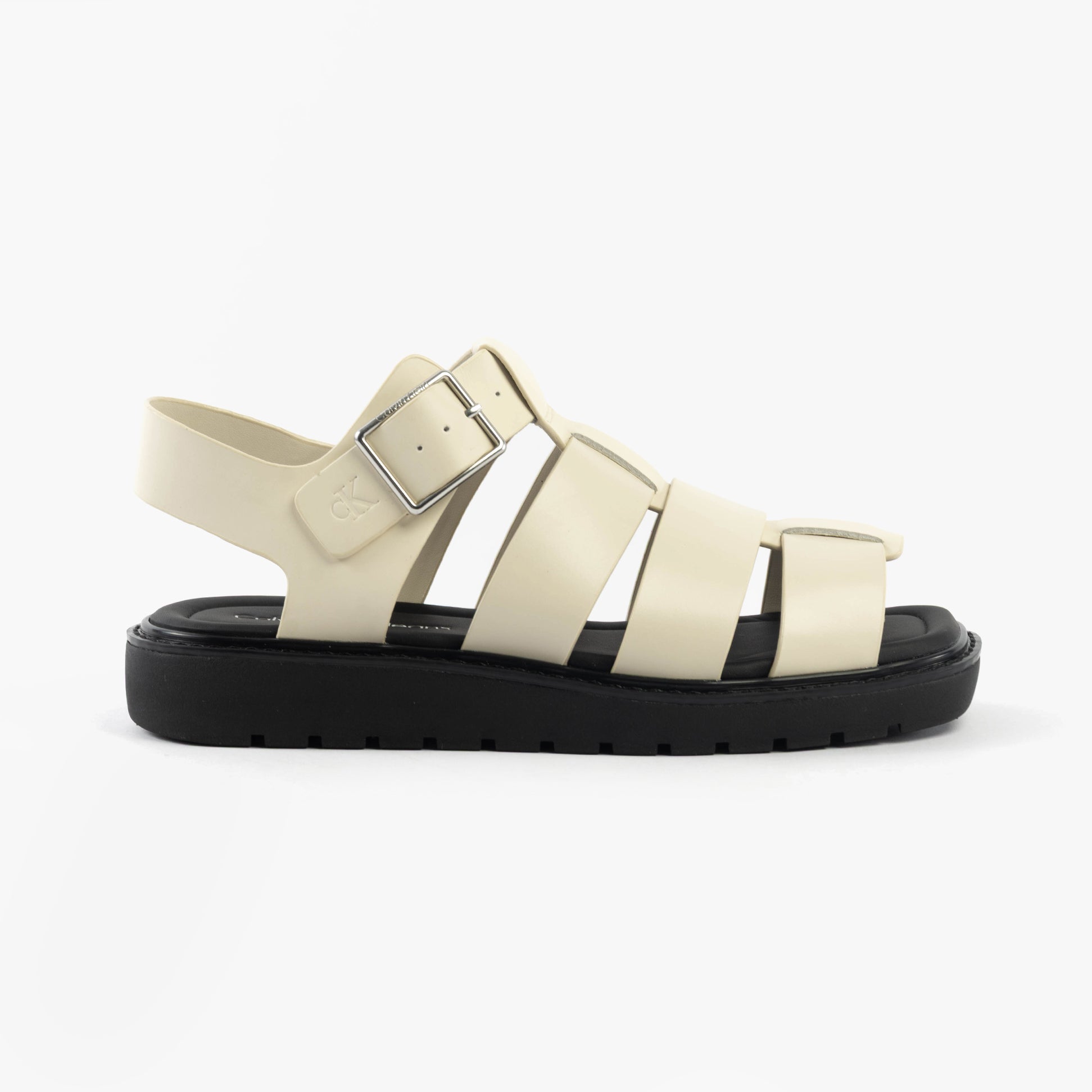 Calvin Klein LEATHER FISHERMAN Womens Sandals Turtle Dove/Black side view showcasing the leather upper and buckle detail.