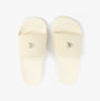 Calvin Klein MONOGRAM Womens Slides Turtle Dove top view showcasing beige color and logo.