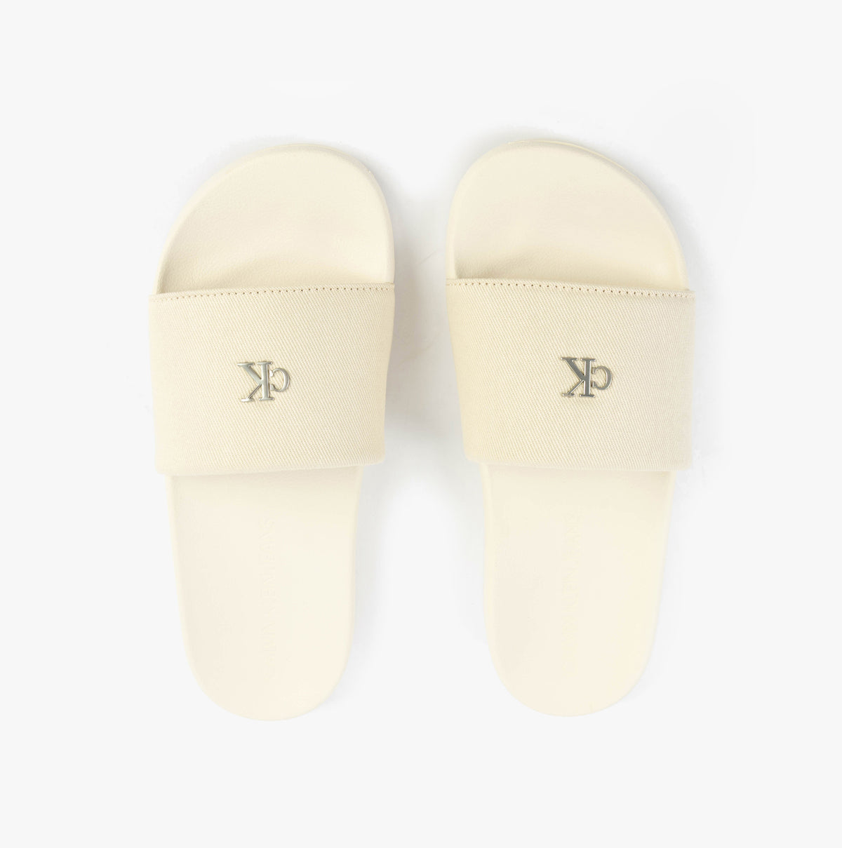 Calvin Klein MONOGRAM Womens Slides Turtle Dove top view showcasing beige color and logo.