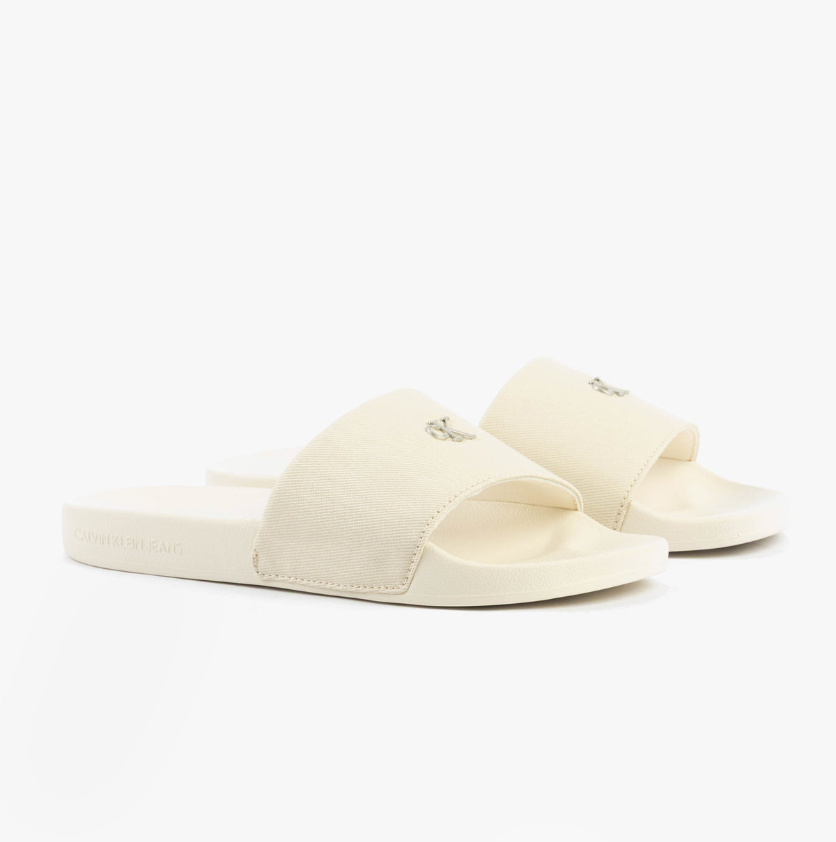 Calvin Klein MONOGRAM Womens Slides Turtle Dove side view showing light cotton upper and comfortable slip-on design.