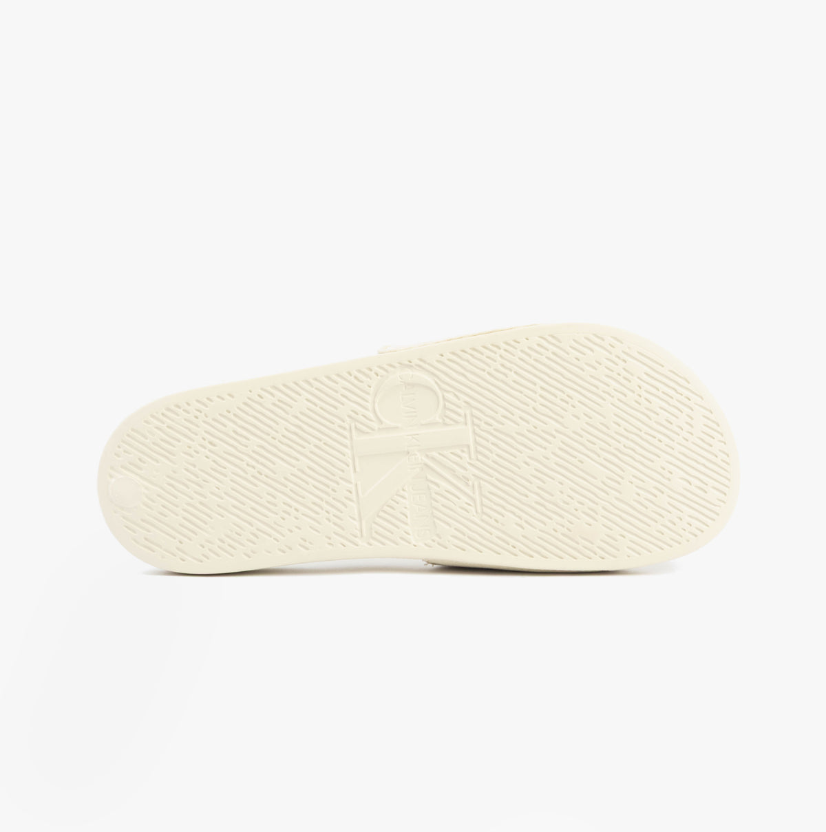 Calvin Klein MONOGRAM Womens Slides Turtle Dove bottom view showcasing the textured sole and brand logo.