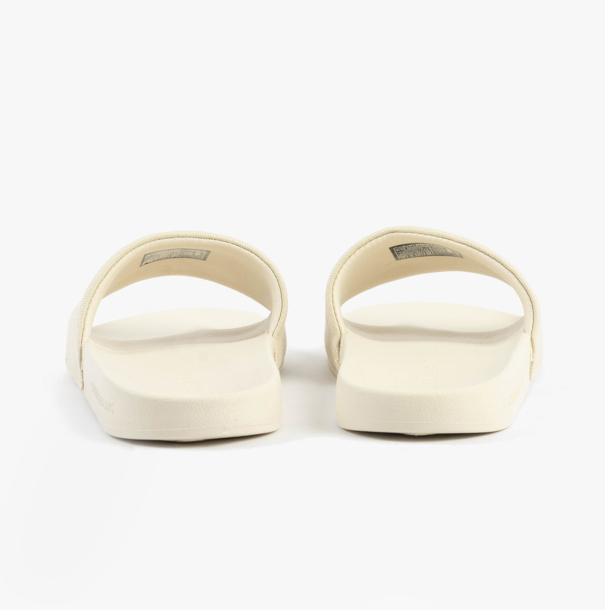 Calvin Klein MONOGRAM Womens Slides Turtle Dove rear view showcasing the slip-on design and flat sole.