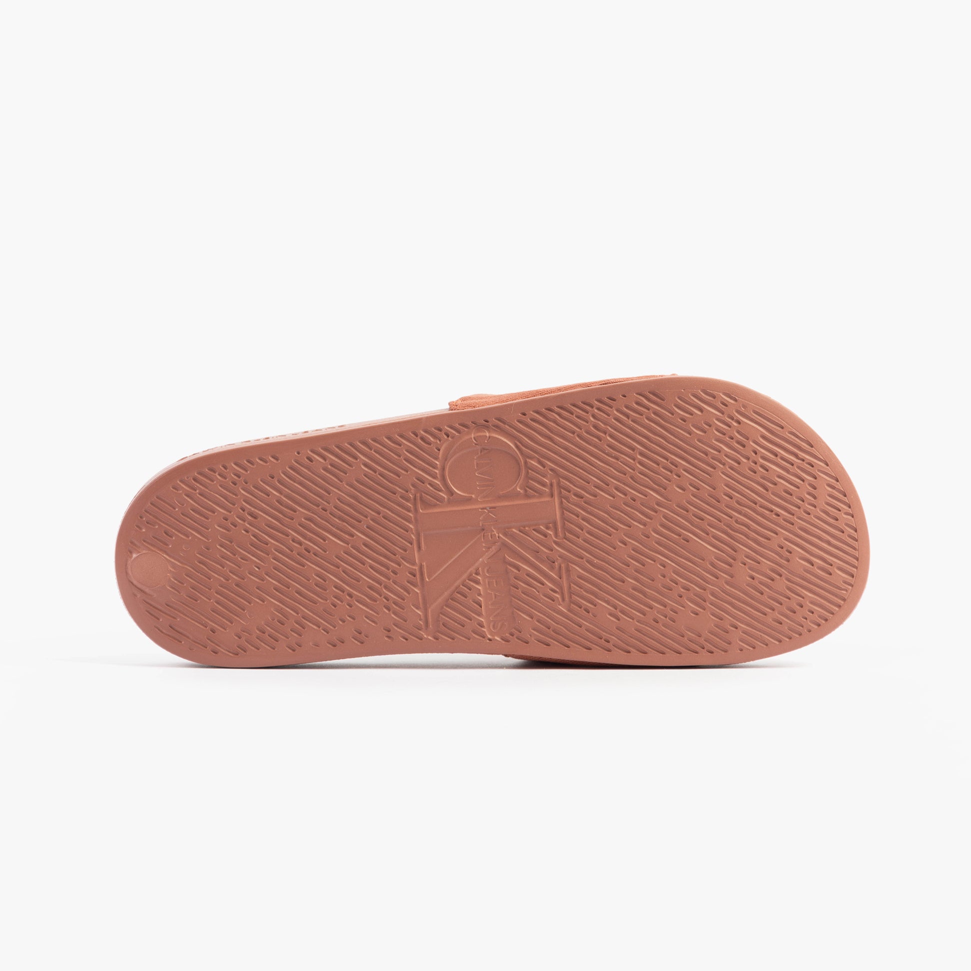 Calvin Klein LOGO MONOGRAM Womens Slides Aragon bottom view of sole with textured pattern and logo.