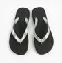 Calvin Klein BEACH SANDAL MONOLOG Womens Sandals Black/Silver top view showcasing the flat design and silver accents.