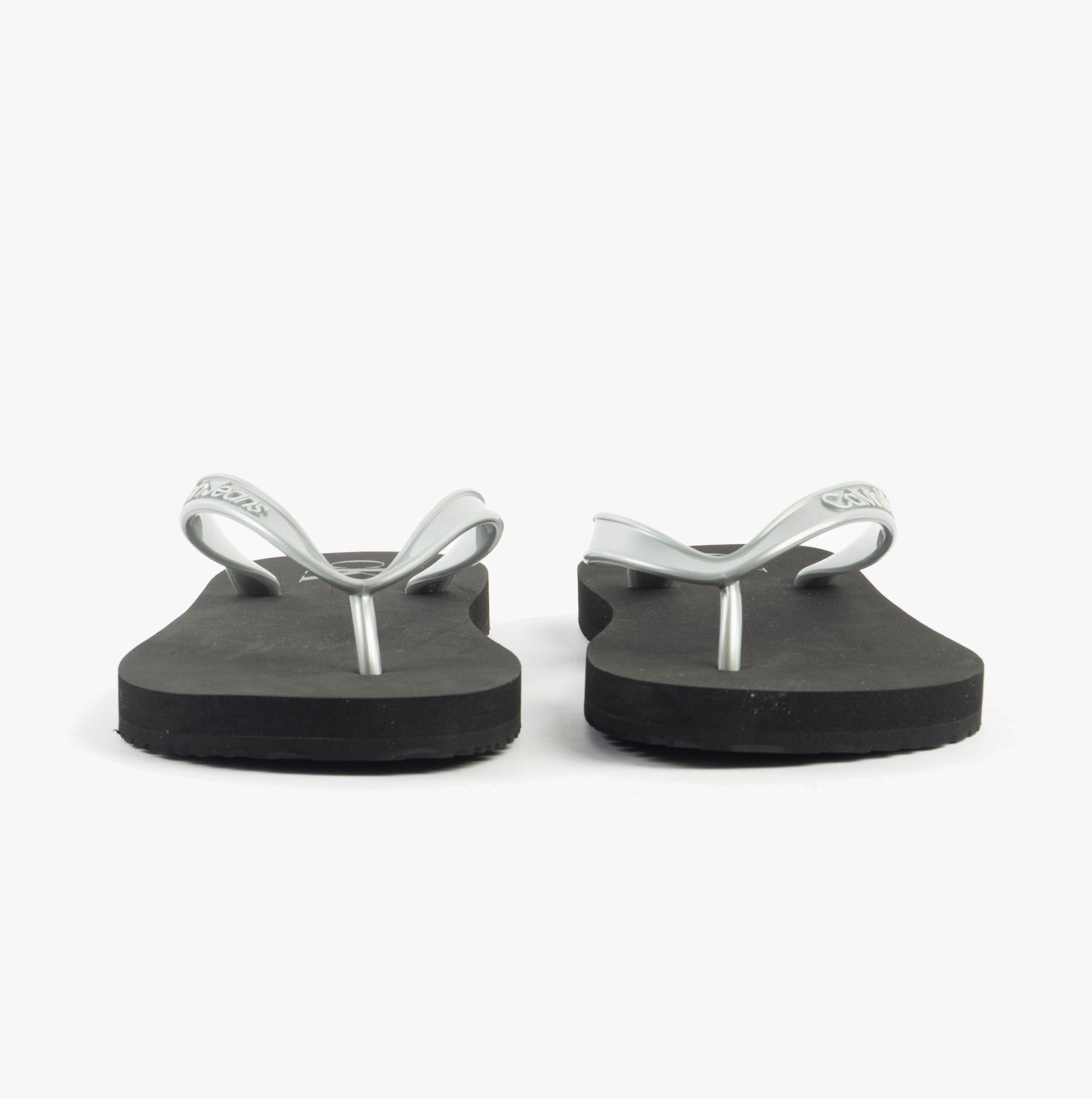 Calvin Klein BEACH SANDAL MONOLOG Womens Sandals Black/Silver front view showing sleek design and flat sole.