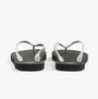 Calvin Klein BEACH SANDAL MONOLOG Womens Sandals Black/Silver rear view showcasing the flat sole and straps.