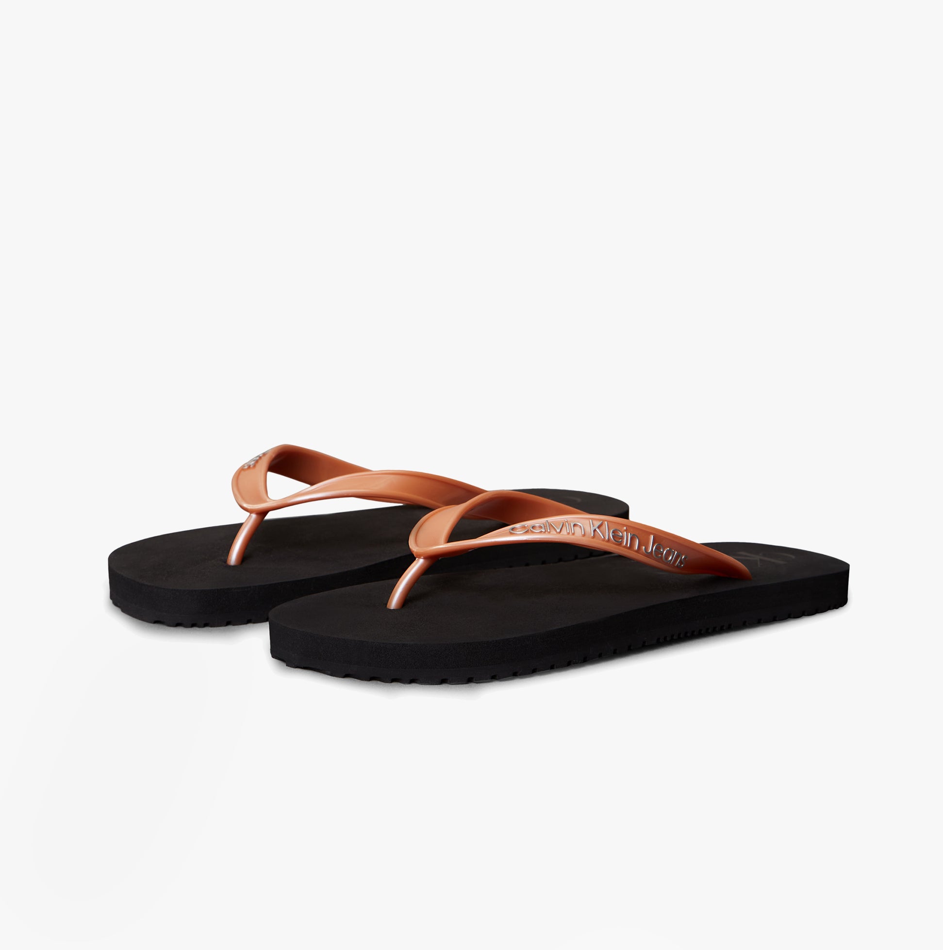 Calvin Klein BEACH SANDAL MONOLOGUE Womens Flip Flops Black/Dusty Coral side view showcasing tan straps and black sole