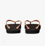 Calvin Klein BEACH SANDAL MONOLOGUE Womens Flip Flops Black/Dusty Coral back view showing the unique design and comfortable fit.