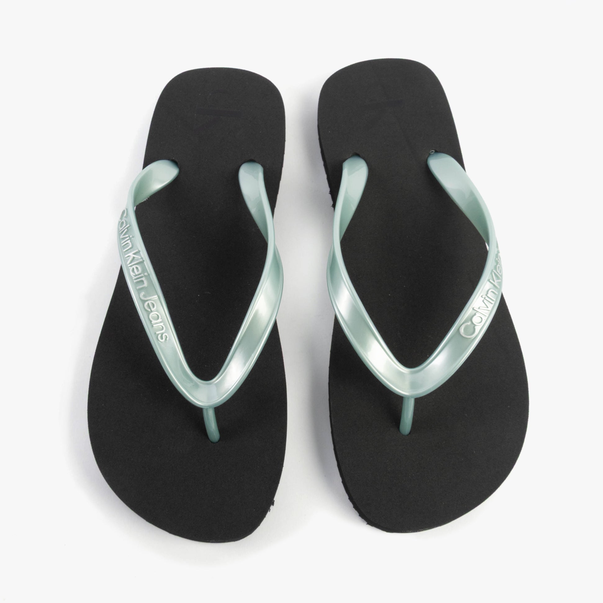 Calvin Klein BEACH SANDAL MONOLOG Womens Sandals Black/Cloud Blue top view showcasing the stylish black and cloud blue design.
