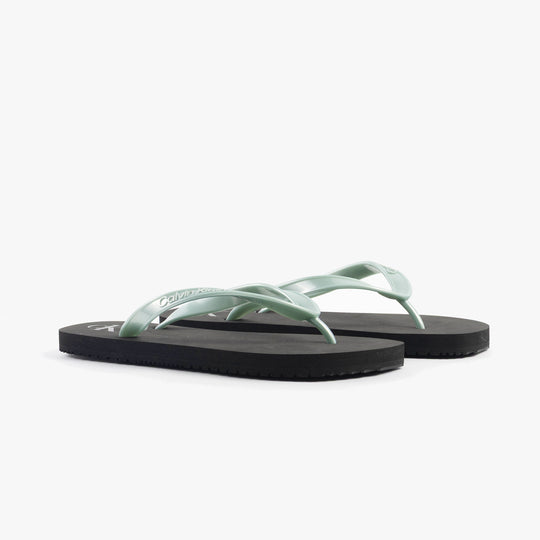 Calvin Klein BEACH SANDAL MONOLOG Womens Sandals Black/Cloud Blue side view showcasing mint green straps and black sole.