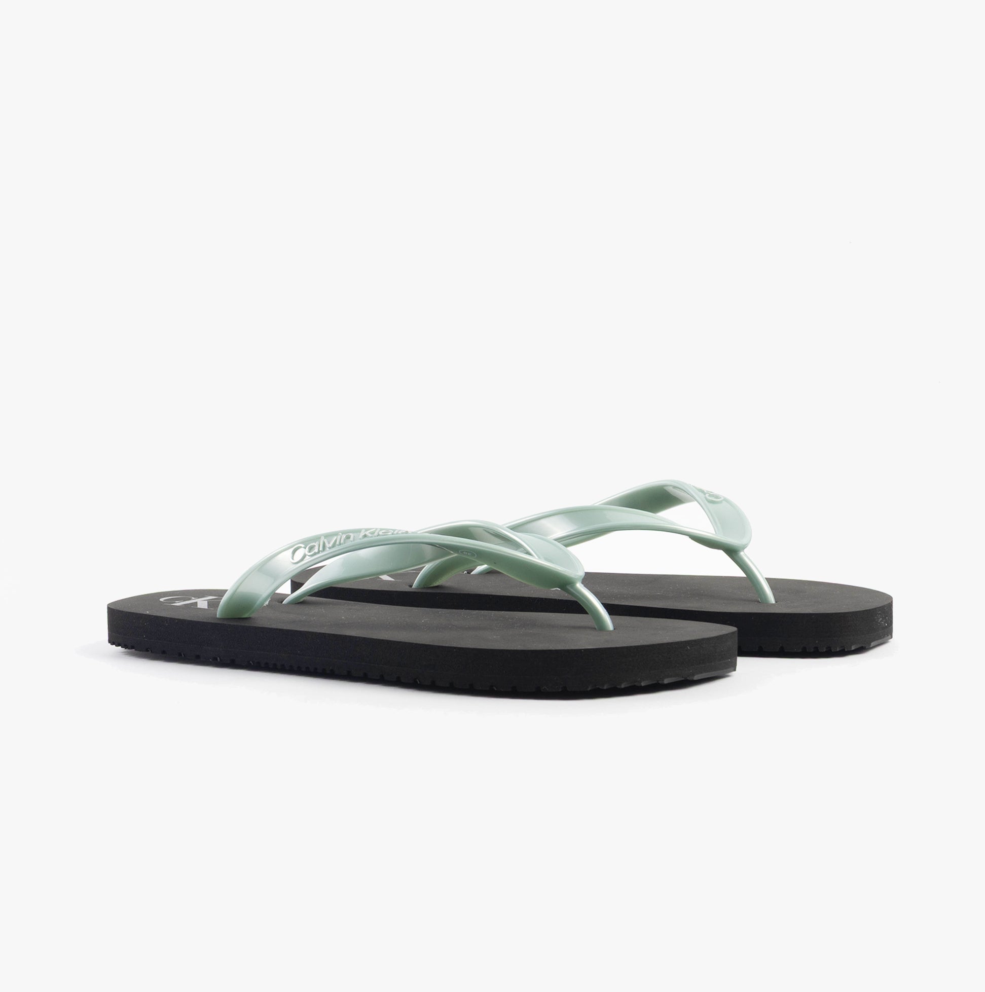 Calvin Klein BEACH SANDAL MONOLOG Womens Sandals Black/Cloud Blue side view showcasing mint green straps and black sole.