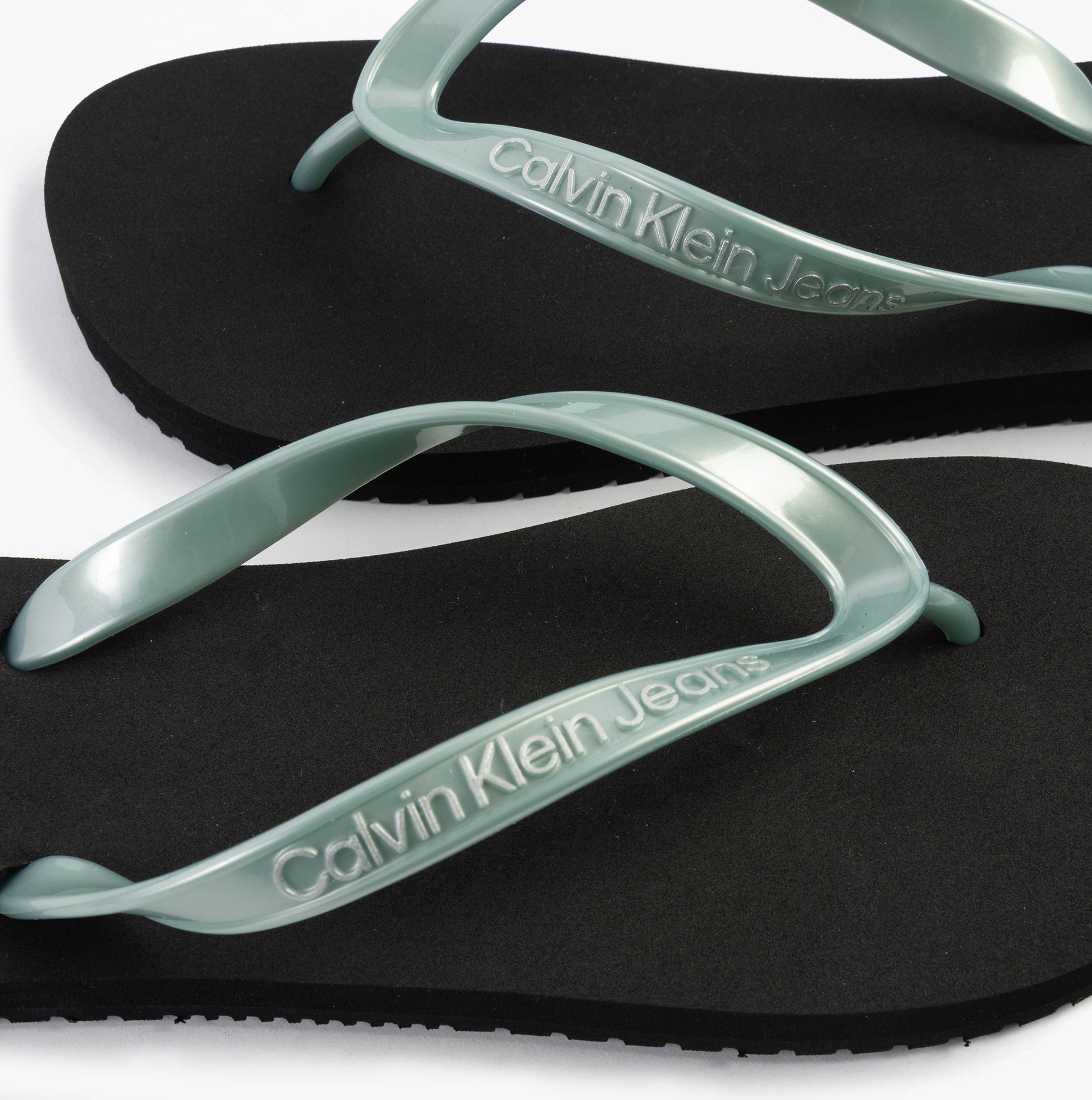 Calvin Klein BEACH SANDAL MONOLOG Womens Sandals Black/Cloud Blue top view showing straps and sole detail.
