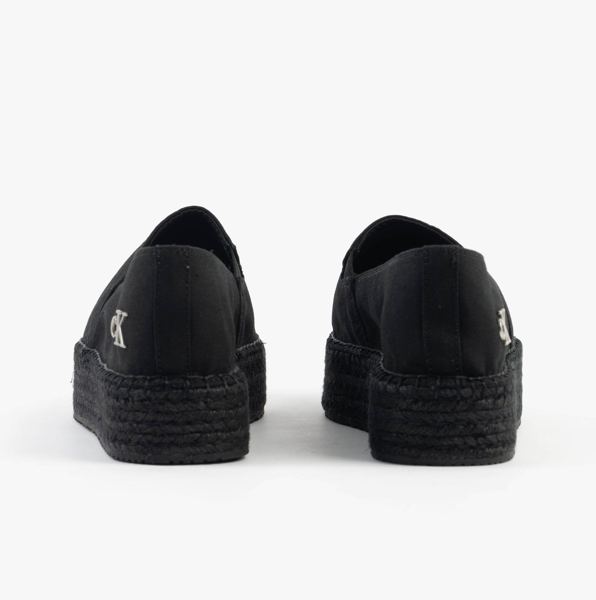 Calvin Klein FLATFORM Espadrille Womens Canvas & Plimsolls Triple Black rear view with platform detail and logo.