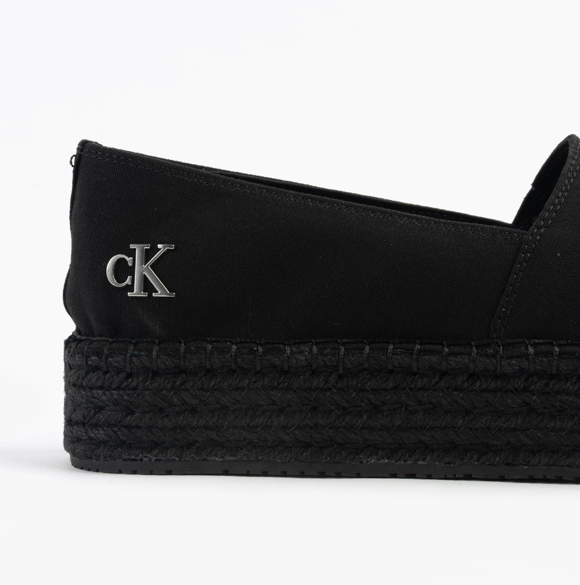 Calvin Klein FLATFORM Espadrille Womens Canvas & Plimsolls Triple Black side view showing logo and braided sole.