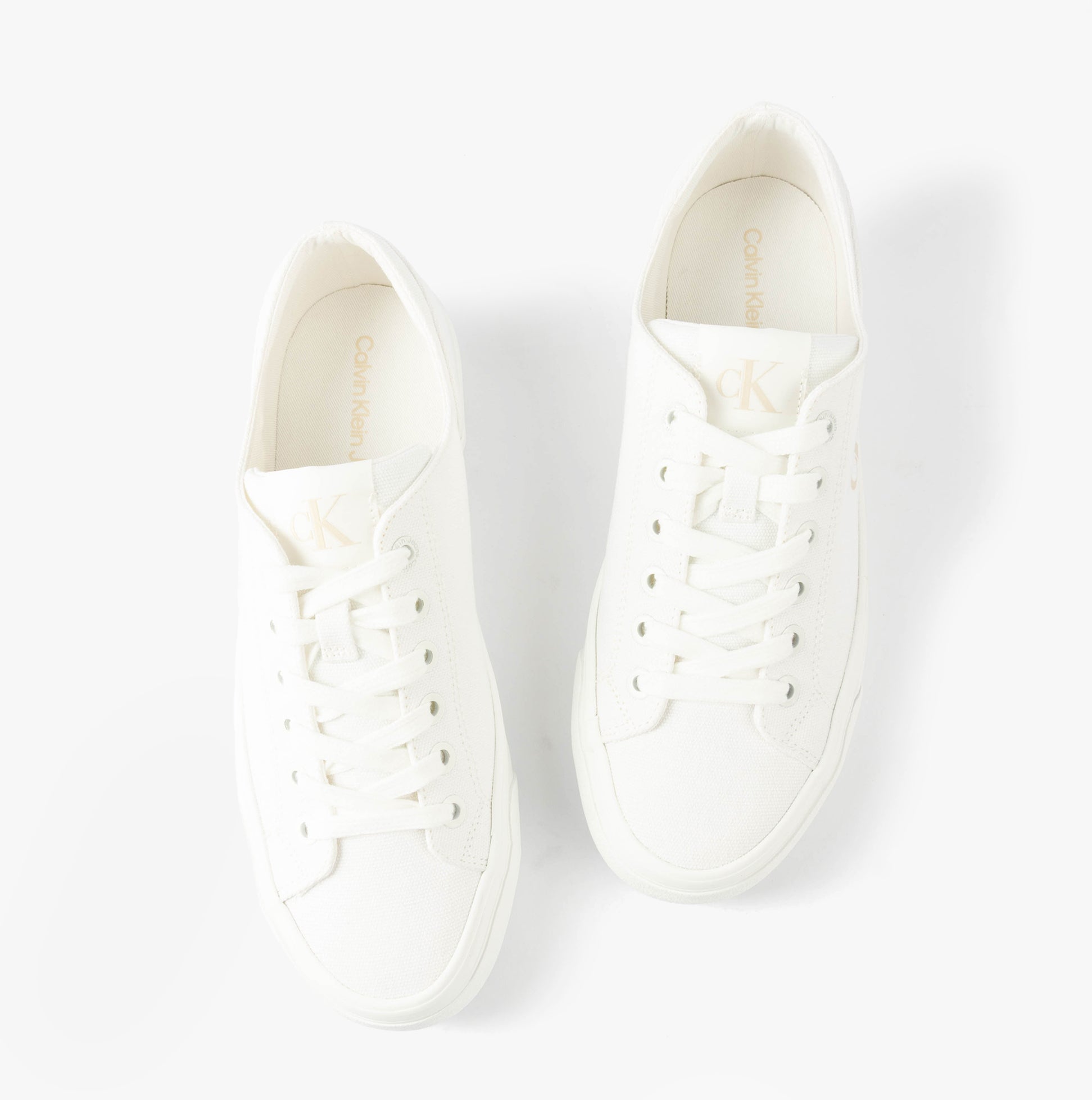Calvin Klein VULC FLATFORM LOW Womens Trainers Triple Bright White top view showing lace-up closure and round toe design.