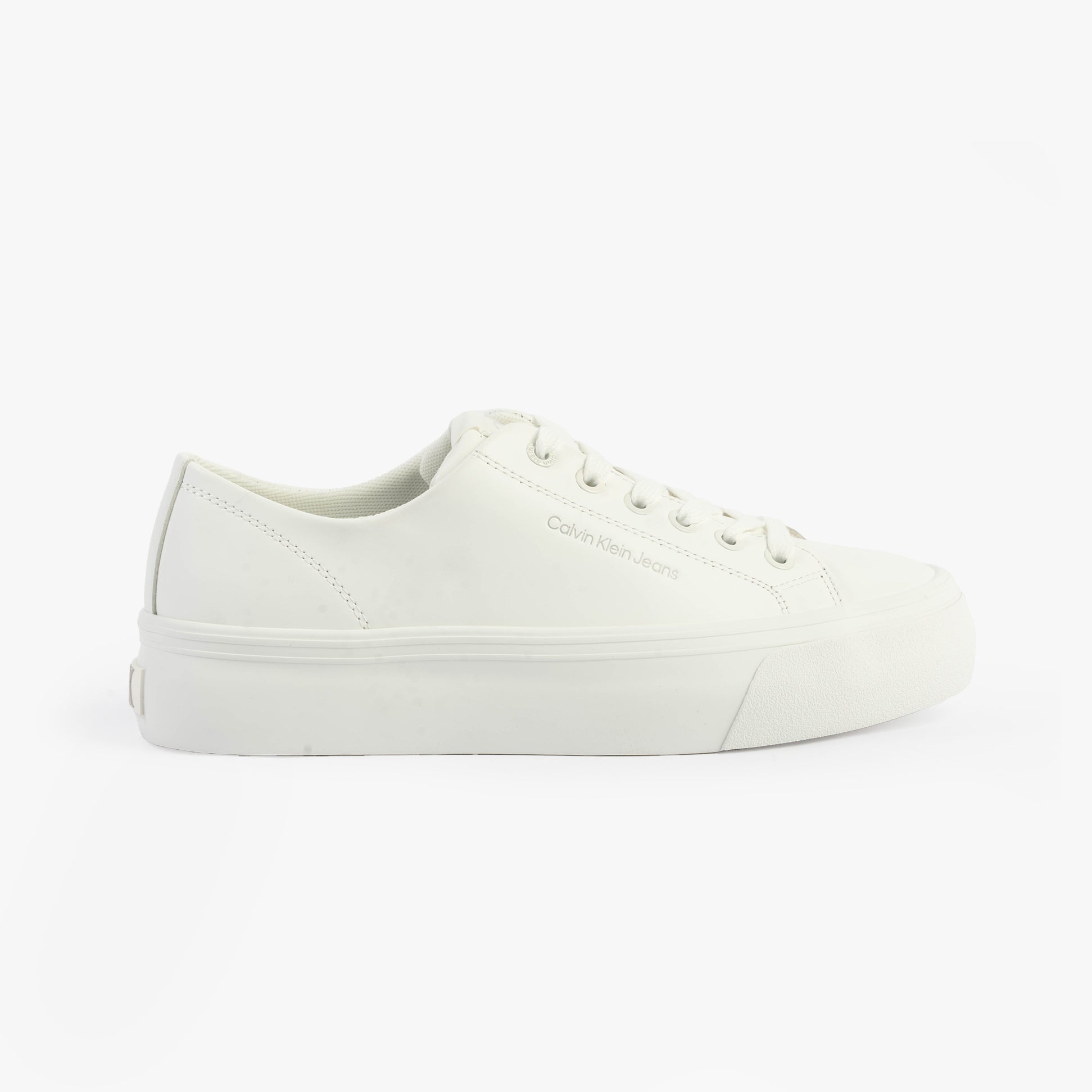 Calvin Klein VULC FLATFORM LOW Womens Trainers Triple Bright White side view showcasing low-top lace-up design.