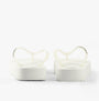 Calvin Klein BEACH SANDAL FLATFORM Womens Sandals Bright White/Black rear view showcasing sleek platform design.