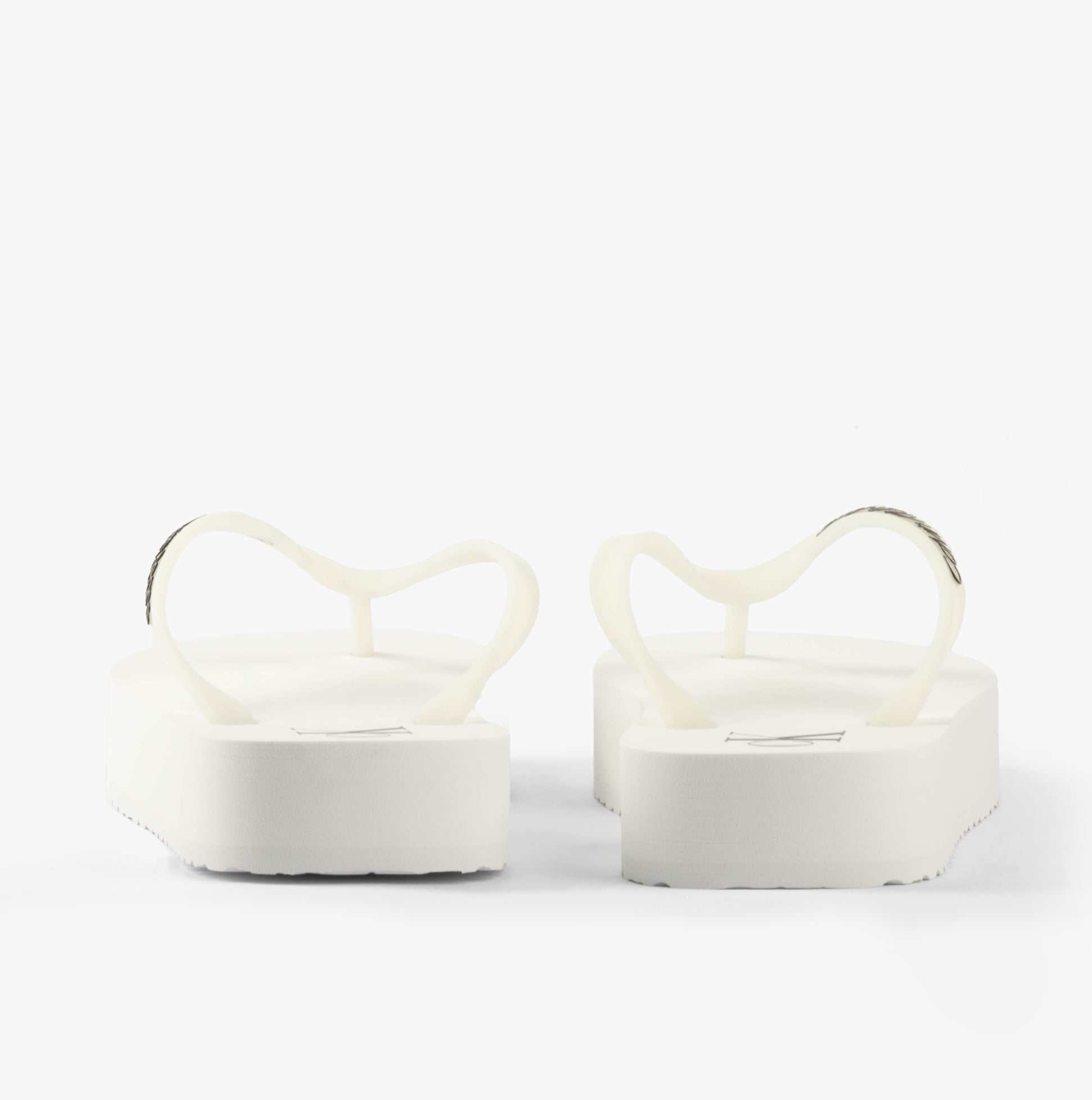 Calvin Klein BEACH SANDAL FLATFORM Womens Sandals Bright White/Black rear view showcasing sleek platform design.