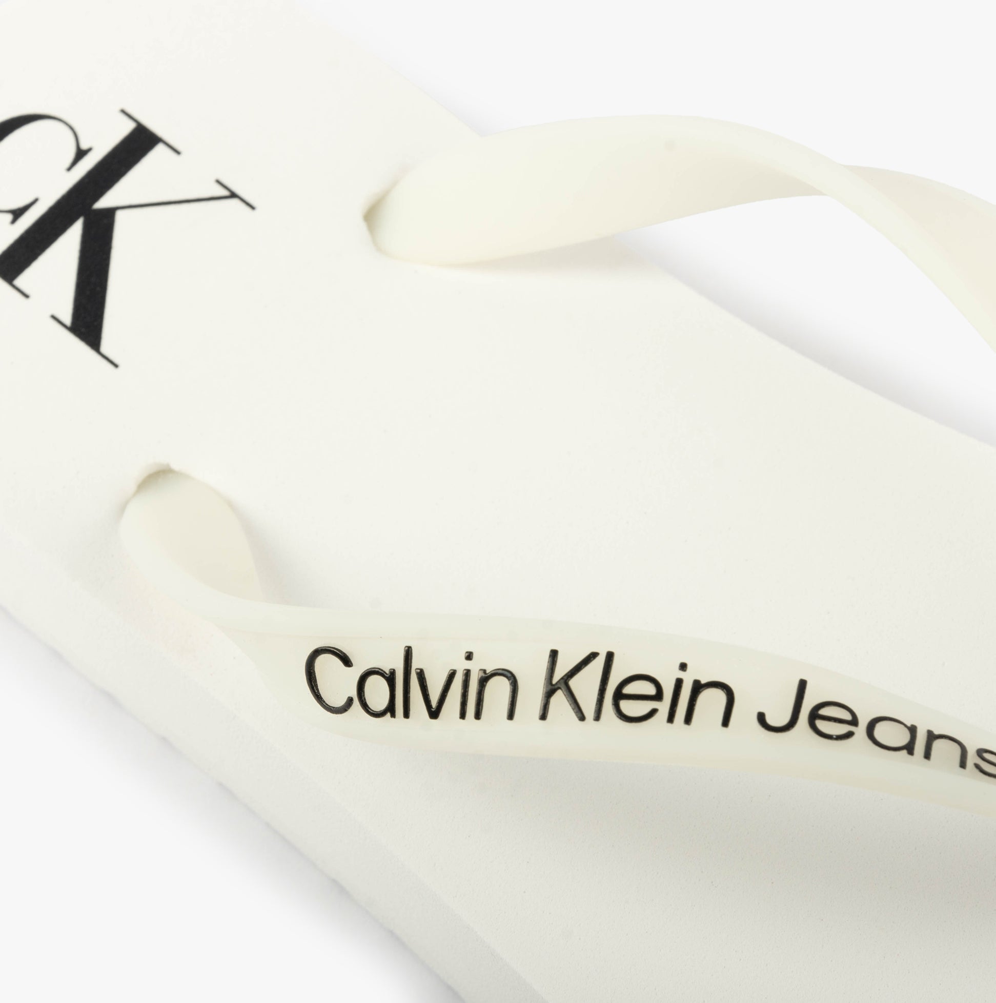 Calvin Klein BEACH SANDAL FLATFORM Womens Sandals Bright White/Black detail view of the sandal strap with branding