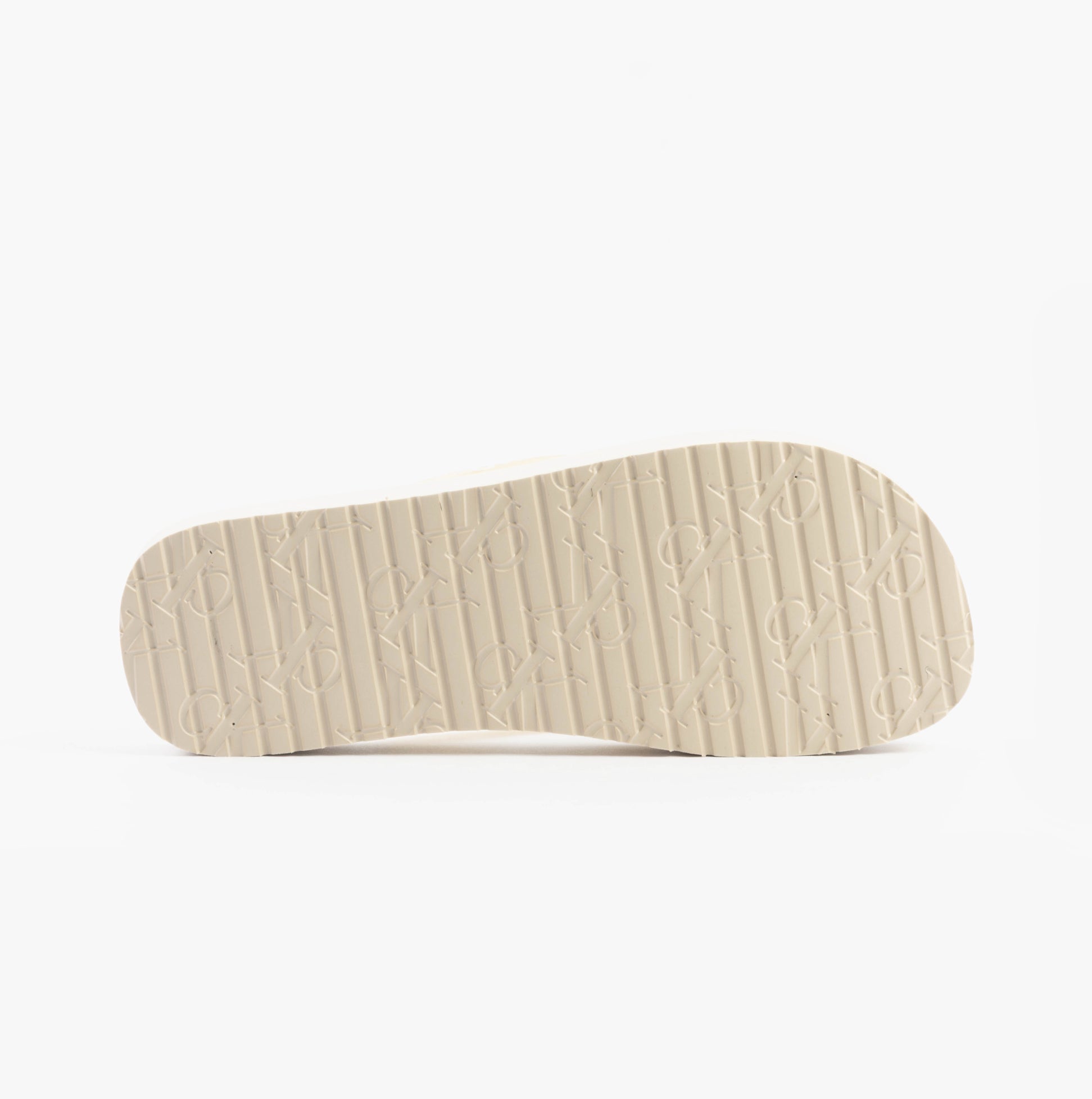 Calvin Klein BEACH SANDAL FLATFORM Womens Sandals Eggshell/Bright White bottom view showing the outsole design and texture.