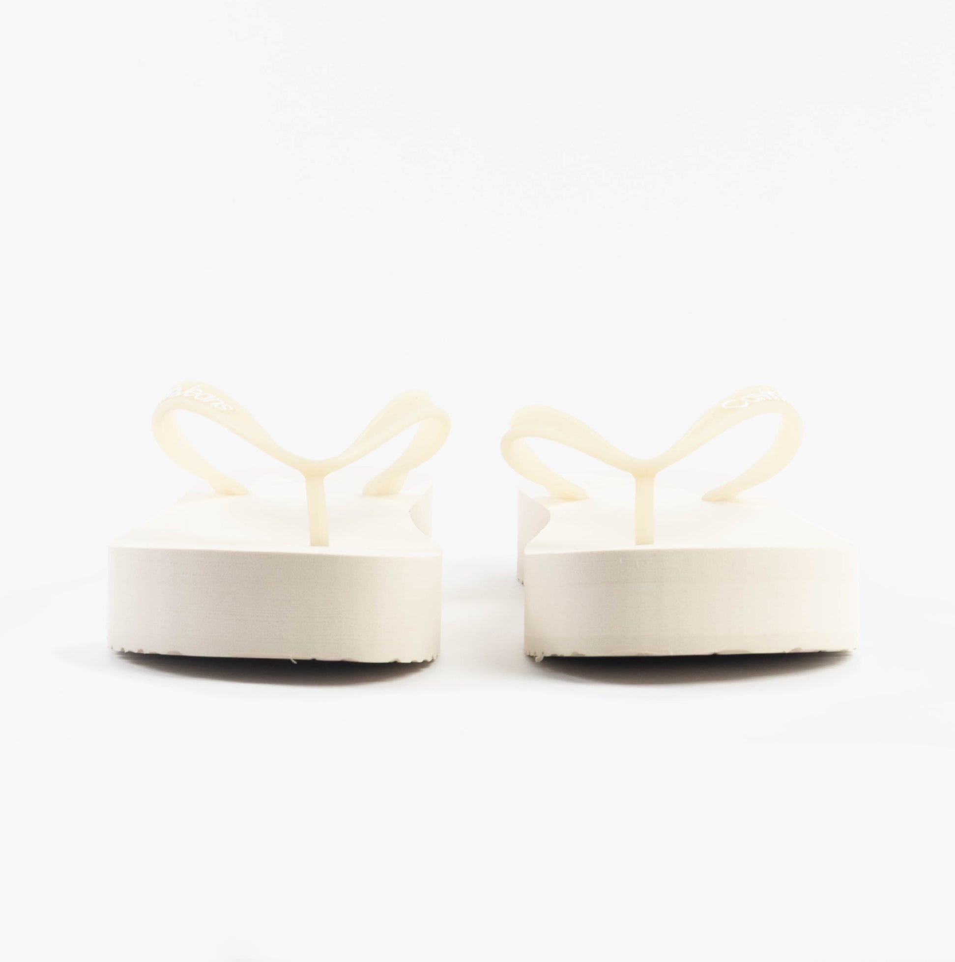 Calvin Klein BEACH SANDAL FLATFORM Womens Sandals Eggshell/Bright White rear view showing platform heel detail.