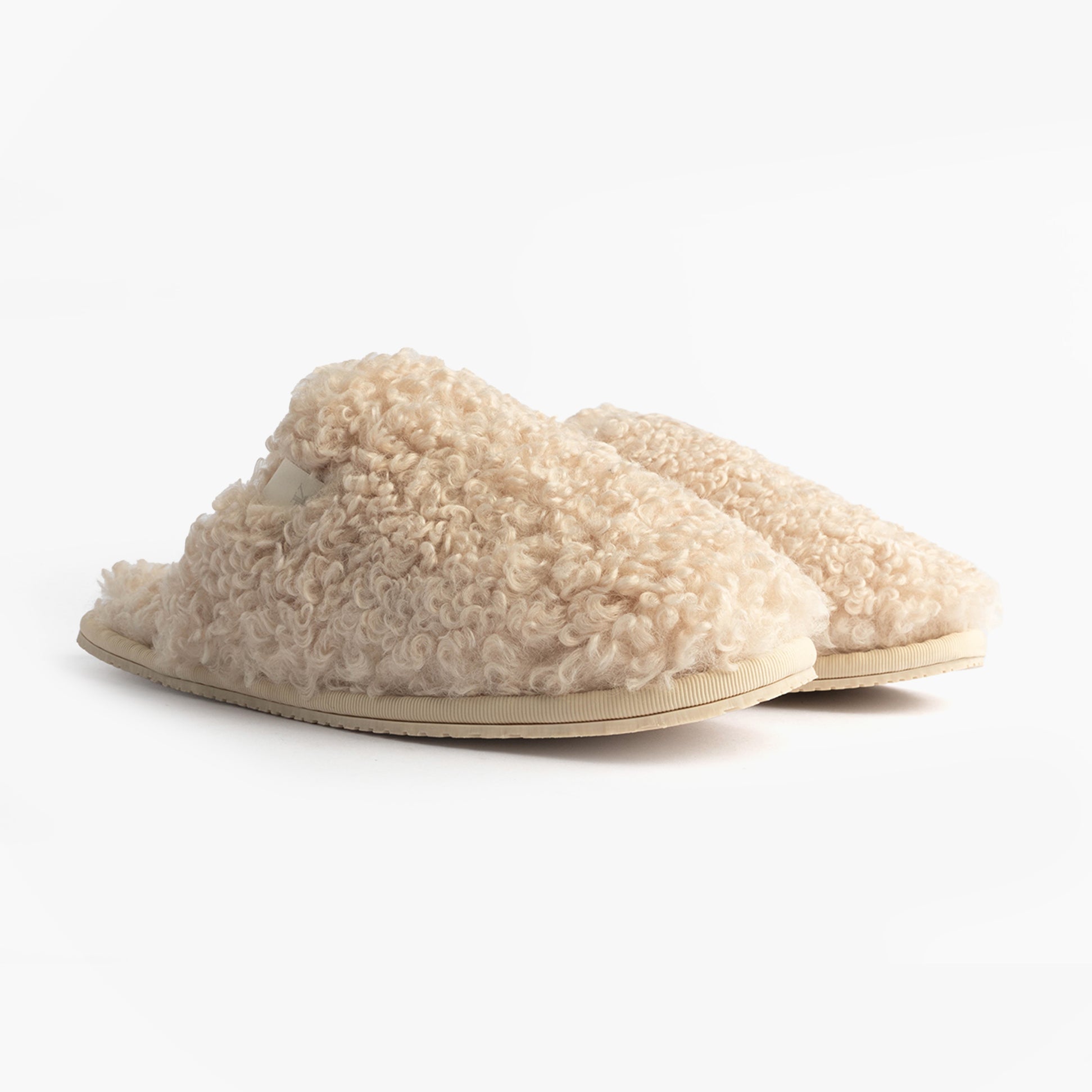 Calvin Klein CLOSE SLIPPER FUR Womens Slippers Marshmallow side view showing fluffy faux fur upper and lightweight sole.