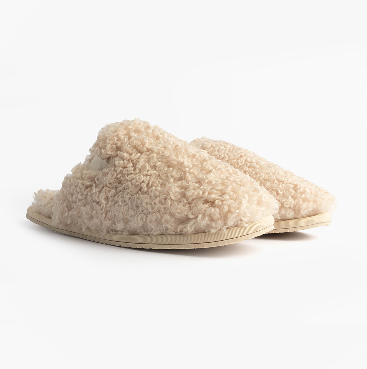 Calvin Klein CLOSE SLIPPER FUR Womens Slippers Marshmallow side view showing fluffy faux fur upper and lightweight sole.