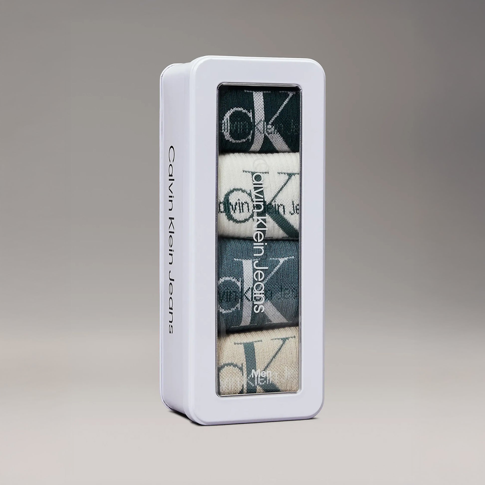 Calvin Klein 4 Pack Giftboxed Trainer Mens Crew Socks Green Combo front view in stylish white gift box.