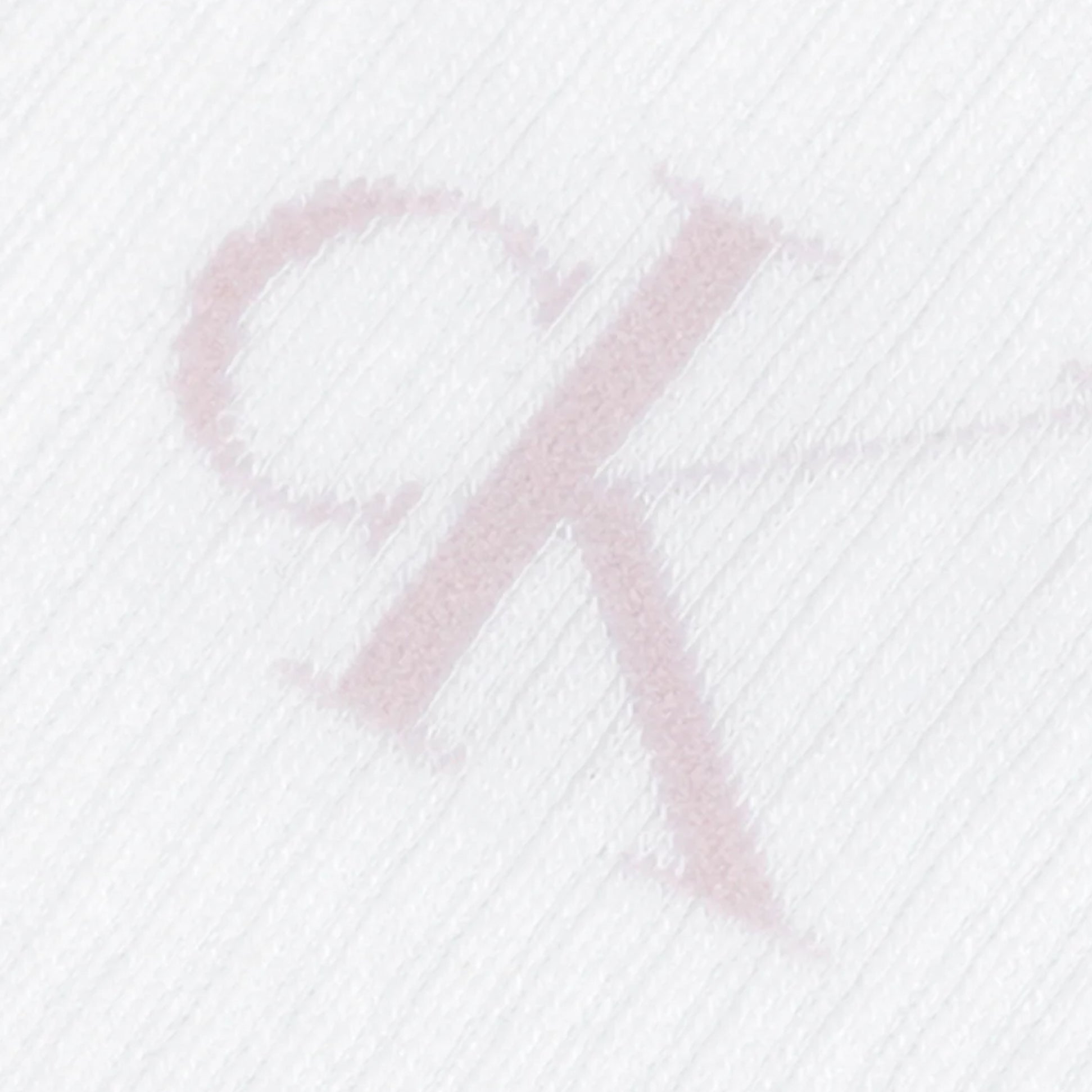 Calvin Klein 4 Pack Giftboxed Trainer Womens Crew Socks Lilac Combo close-up detail view showing logo on soft fabric.