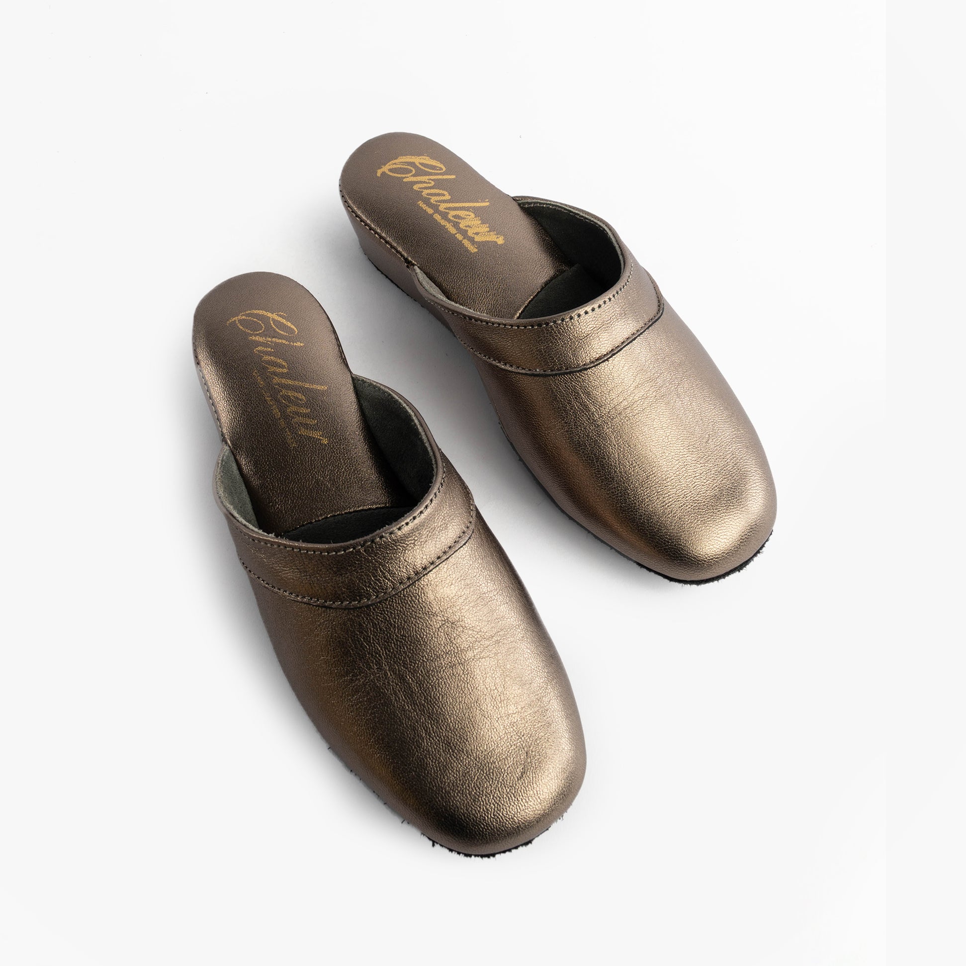 Chaleur FLORENCE Womens Mules Slippers in Gold, top-down view showing smooth metallic surface and rounded toe shape