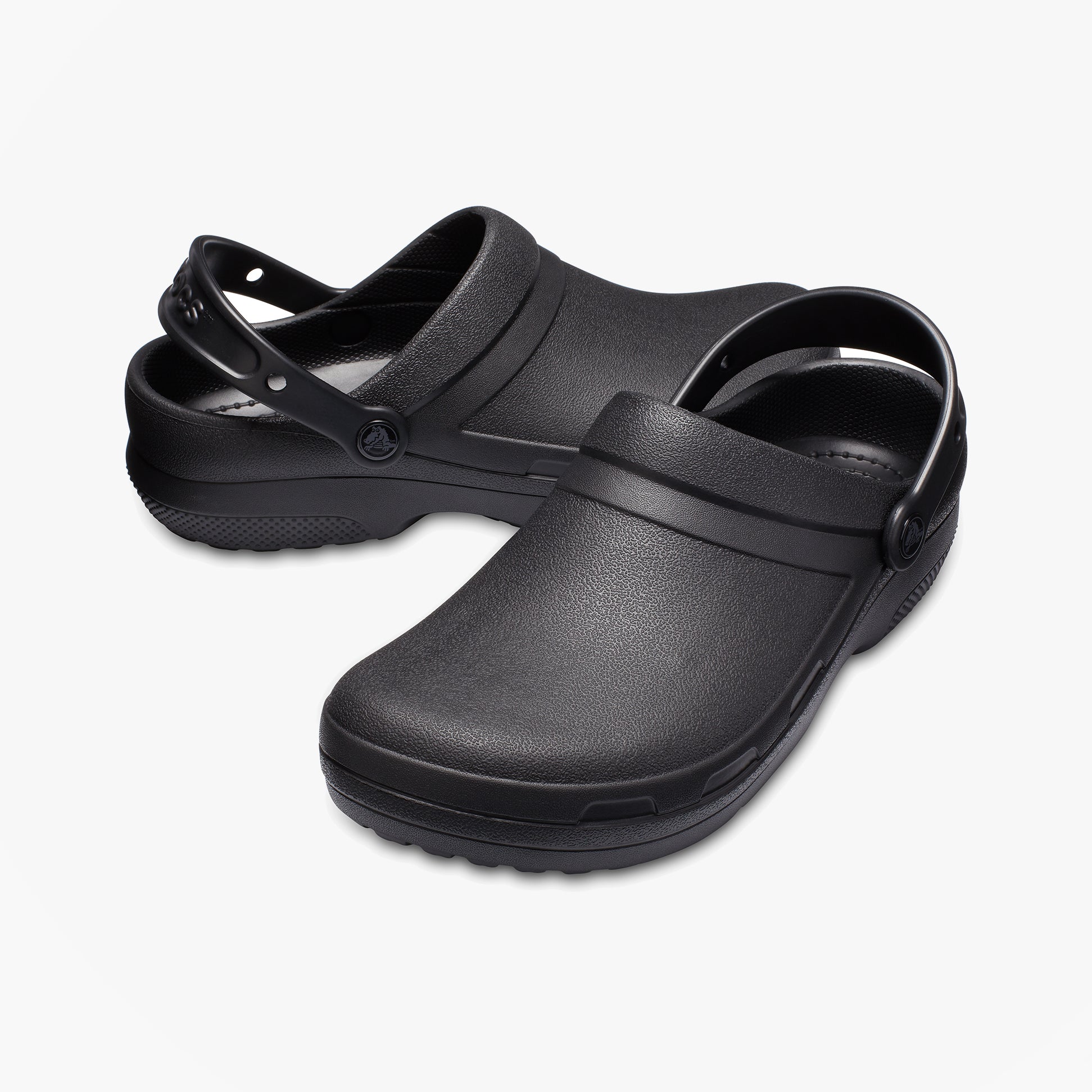 Crocs At Work SPECIALIST II Unisex Work Clogs Black side view showcasing lightweight design and slip-on closure.