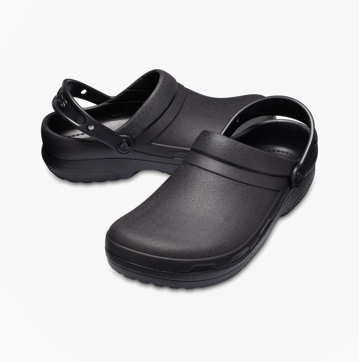 Crocs At Work SPECIALIST II Unisex Work Clogs Black side view showcasing lightweight design and slip-on closure.