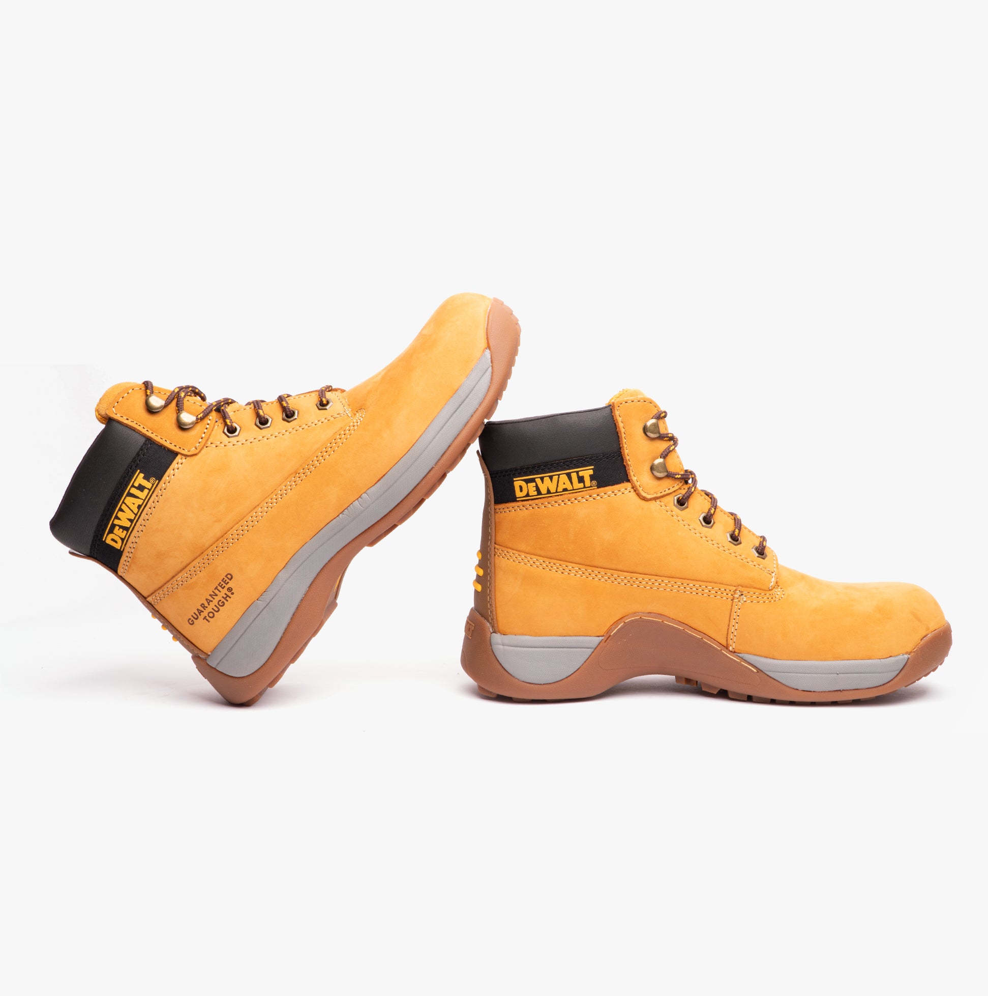 Pair of yellow work boots with black DeWalt logo on a white background