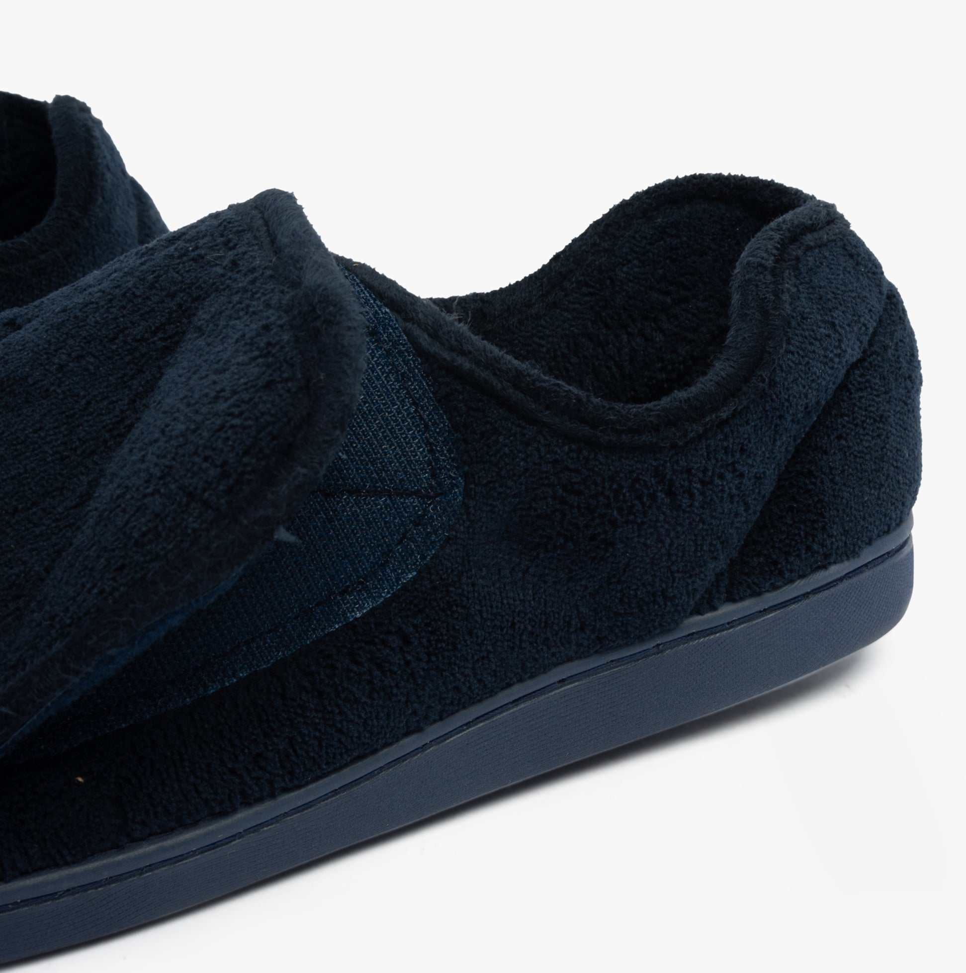 Dr Keller VELVIT Mens Slippers Navy side view showcasing the faux fur material and touch fasten closure.