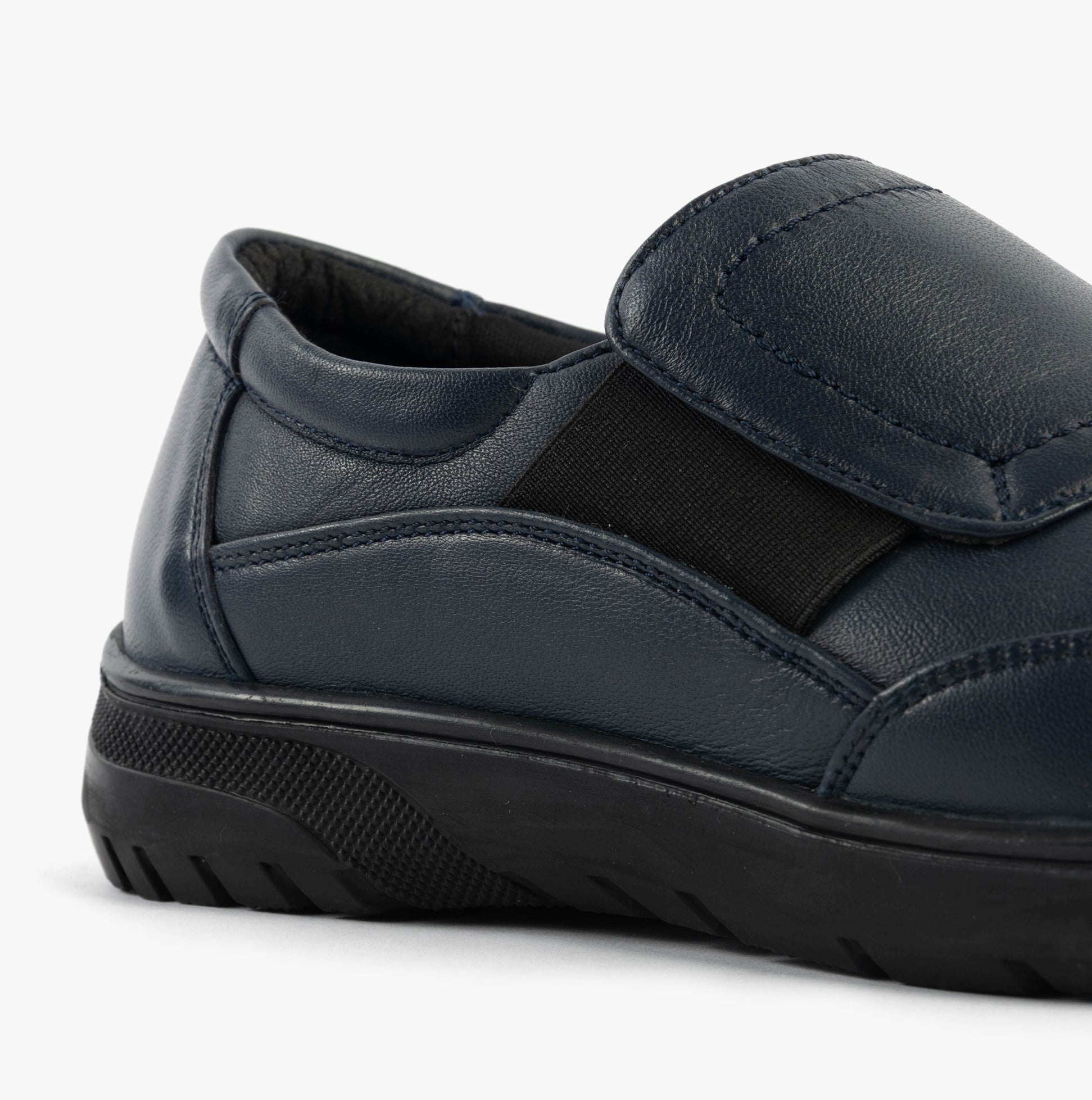 Dr Keller CHLOE Womens Shoes Navy side view showing the leather upper and rubber sole, featuring a touch fasten closure.