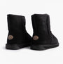 EMU Australia STINGER MINI Womens Sheepskin Boot Black rear view showcasing soft sheepskin upper and rubber sole.