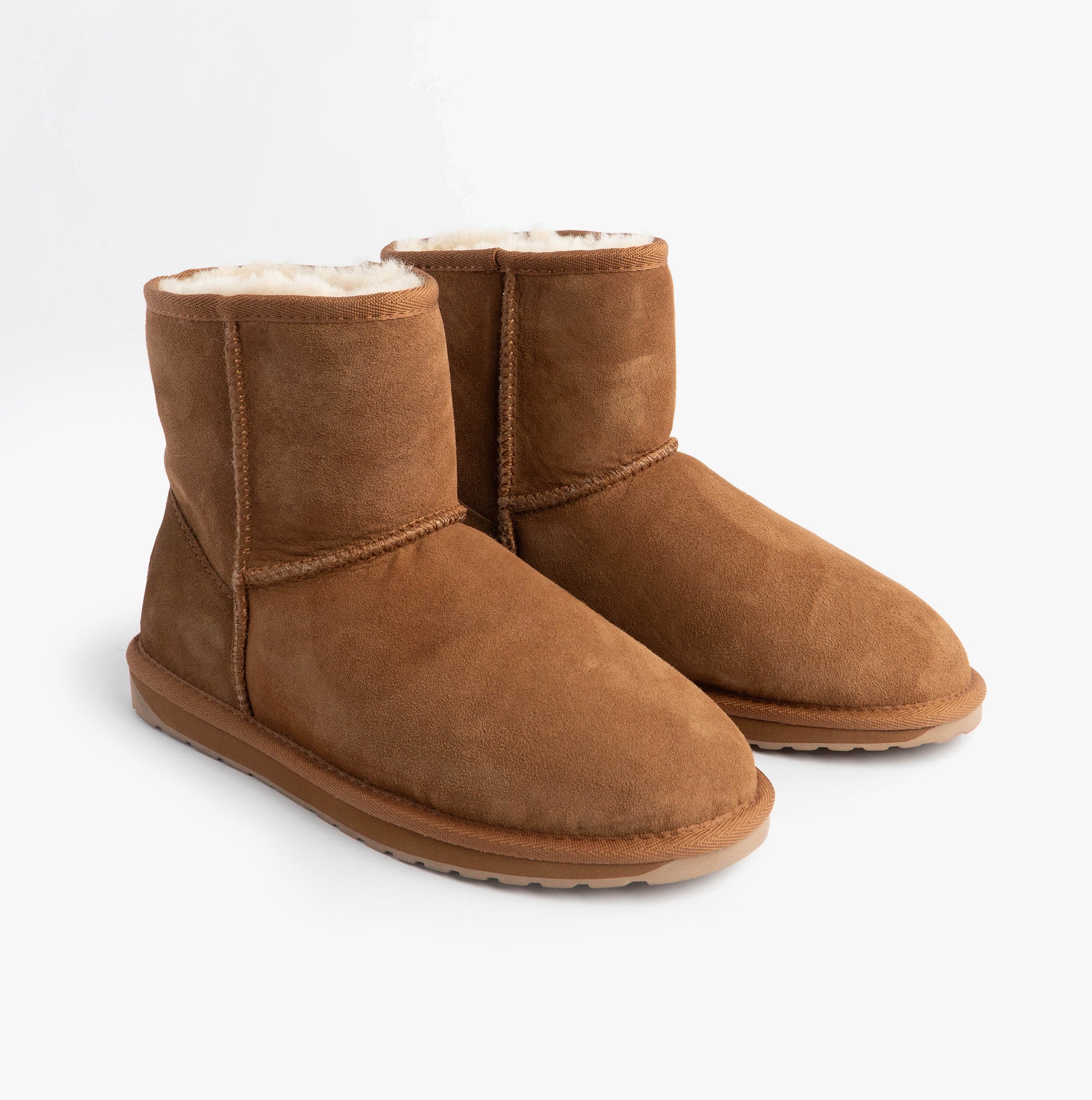 EMU Australia STINGER MINI Womens Sheepskin Boot Chestnut side view with mid-calf shearling design and rubber sole.