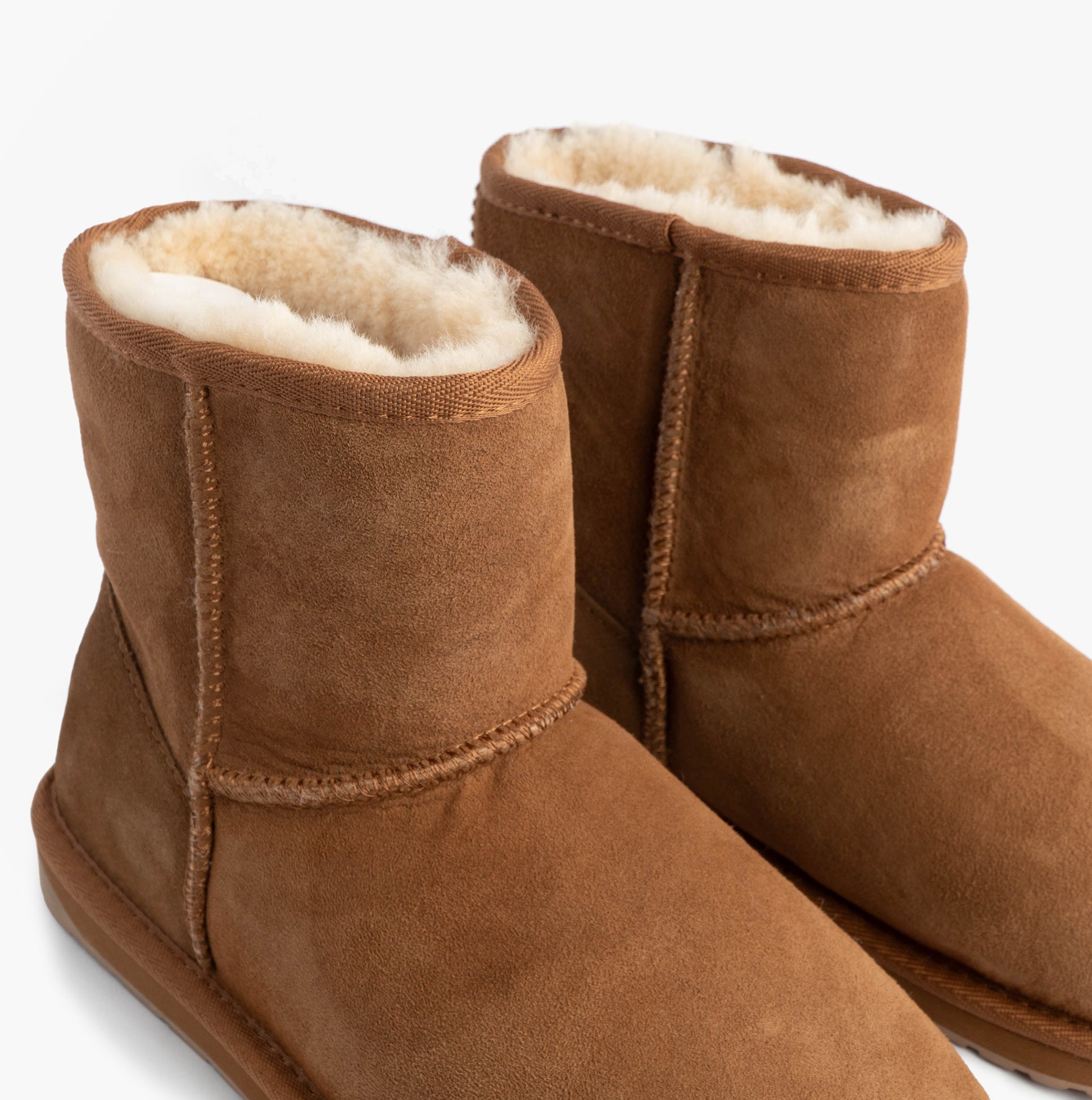 EMU Australia STINGER MINI Womens Sheepskin Boot Chestnut side view showing soft sheepskin lining and brown suede exterior.