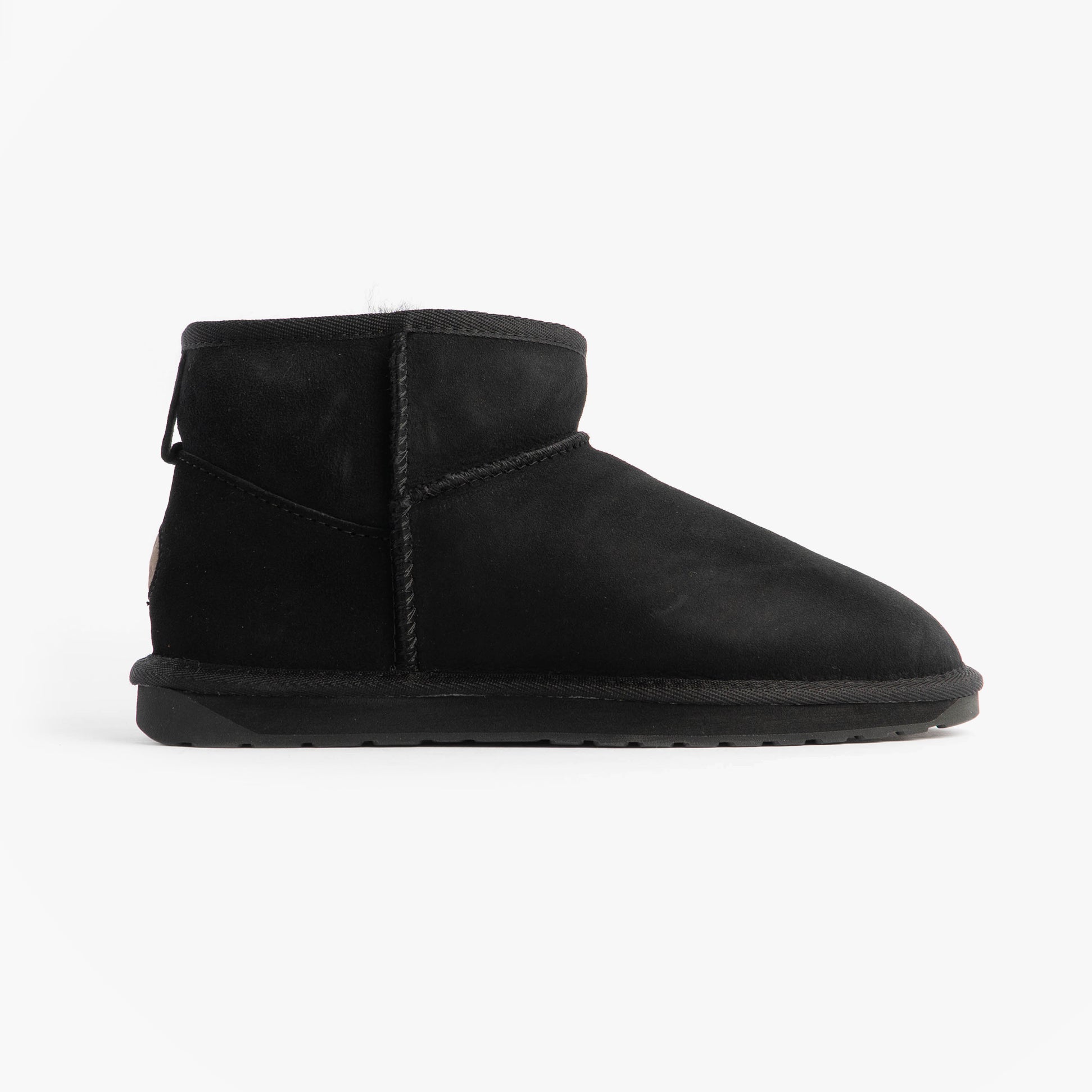 EMU Australia STINGER MICRO Womens Sheepskin Boot Black side view showcasing sheepskin upper and rubber sole.