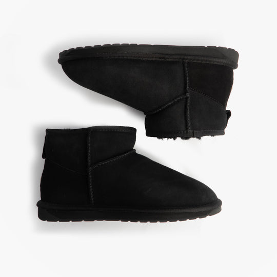 EMU Australia STINGER MICRO Womens Sheepskin Boot Black side view of ankle boots on white background.
