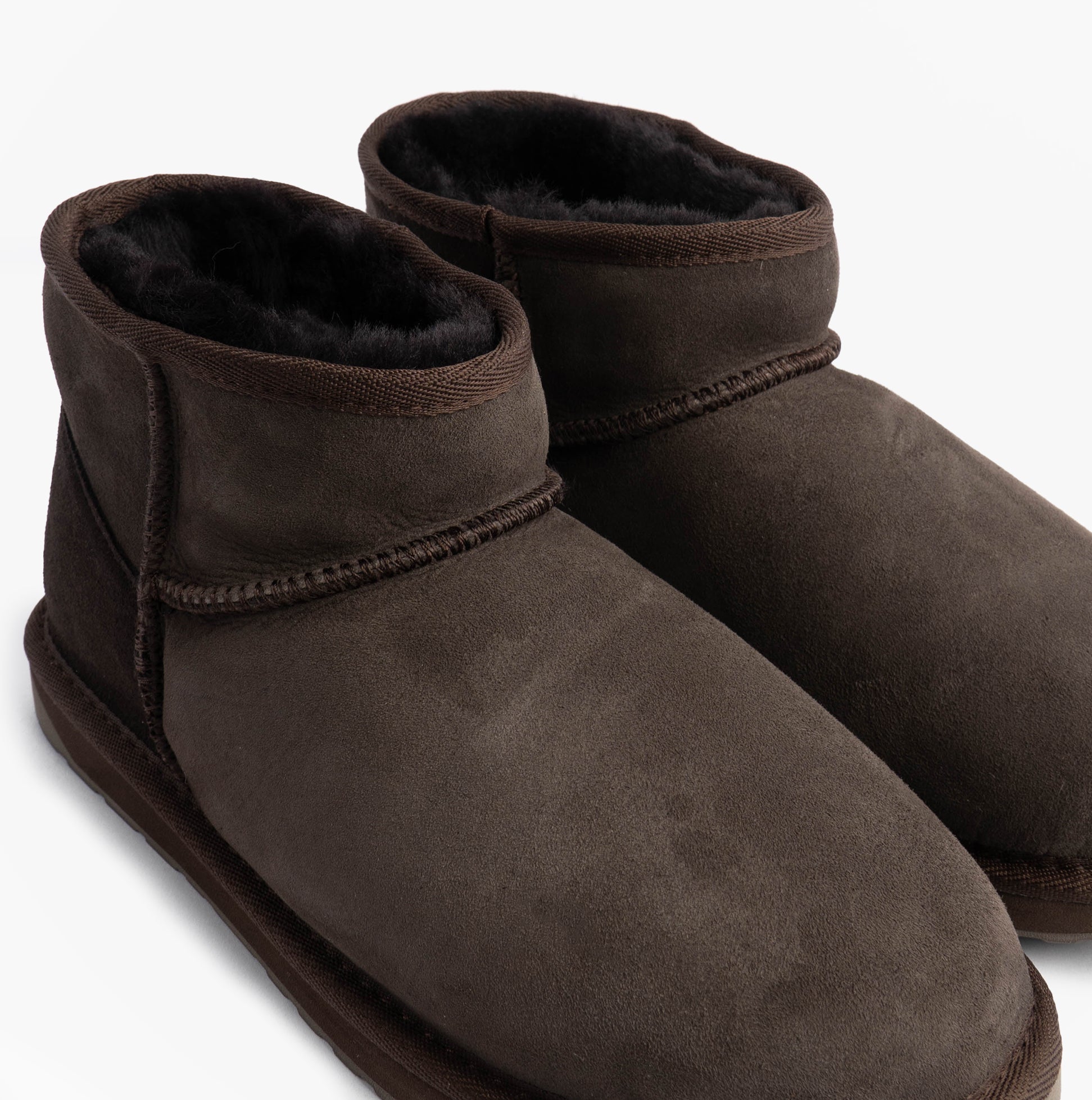 EMU Australia STINGER MICRO Womens Sheepskin Boot Chocolate front view with shearling lining and round toe shape.