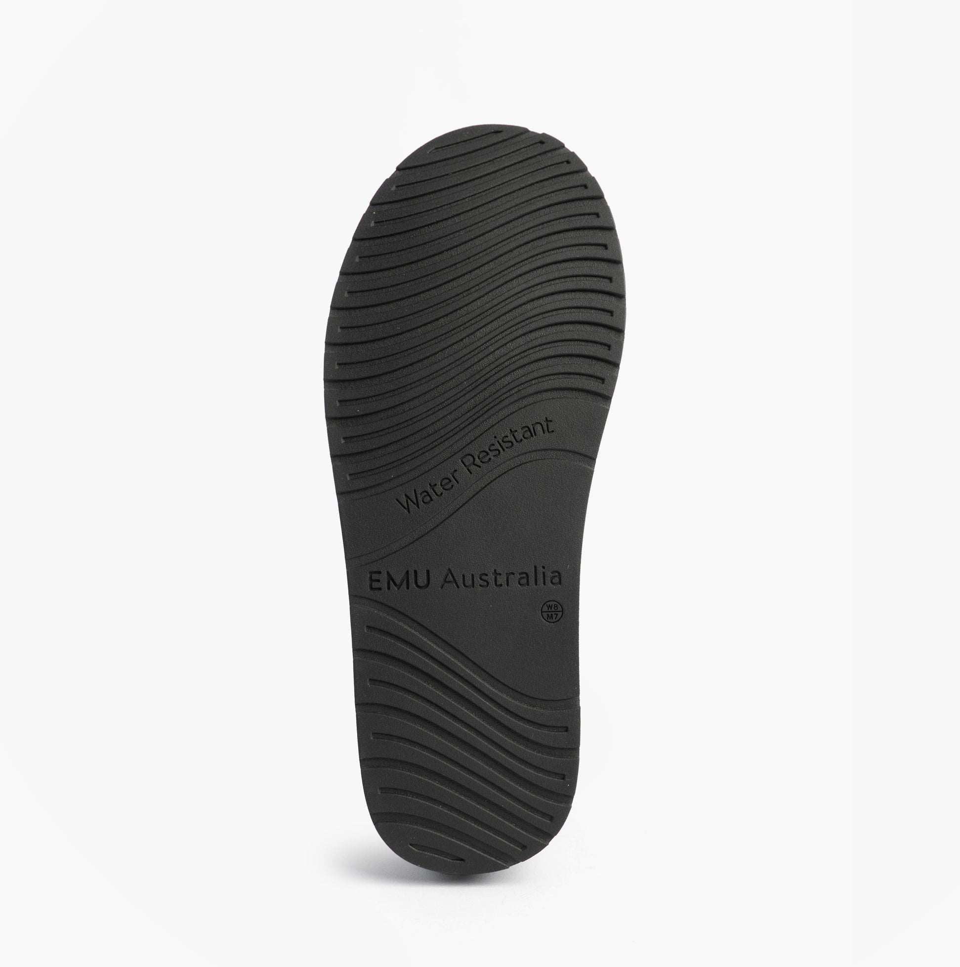 EMU Australia STINGER MICRO FLATFORM Womens Sheepskin Boot Black sole view showing rubber material and water resistant features.
