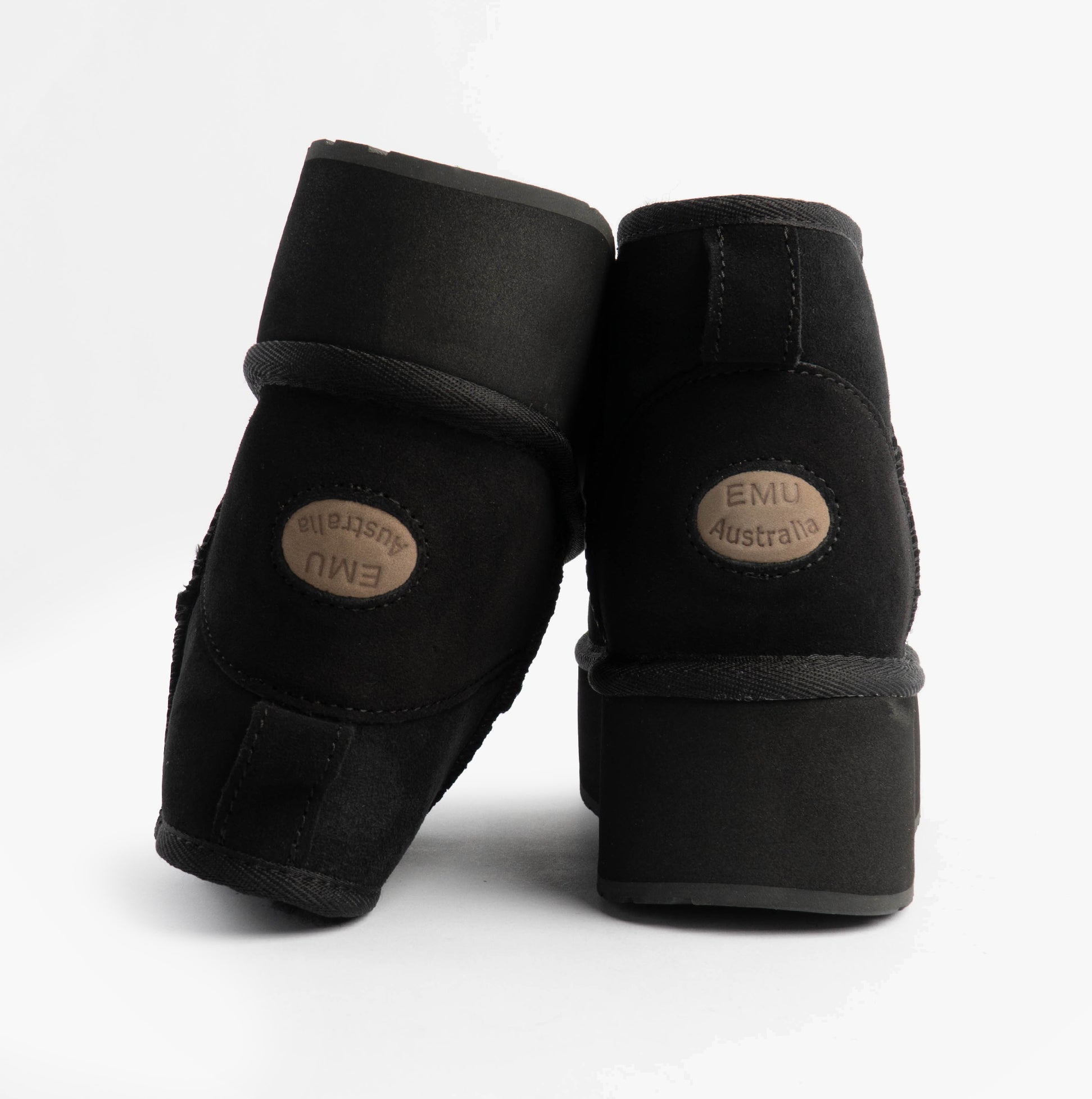 EMU Australia STINGER MICRO FLATFORM Womens Sheepskin Boot Black back view showing branding and soft material.
