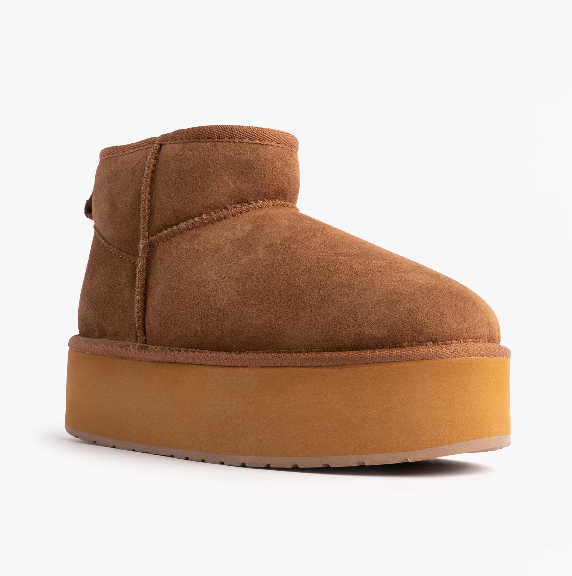 EMU Australia STINGER MICRO FLATFORM Womens Sheepskin Boot Chestnut side view showing shearling upper and platform sole.