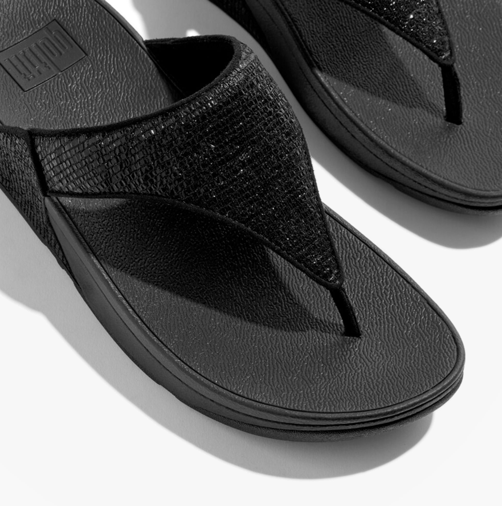 FitFlop LULU CRINKLED-SHIMMER Ladies Toe Post Sandals Metallic Black, top view showcasing glossy black upper.