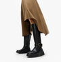 FitFlop F-MODE SQUARE-RING LEATHER FLATFORM Ladies Tall Boots Blac side view with stylish skirt