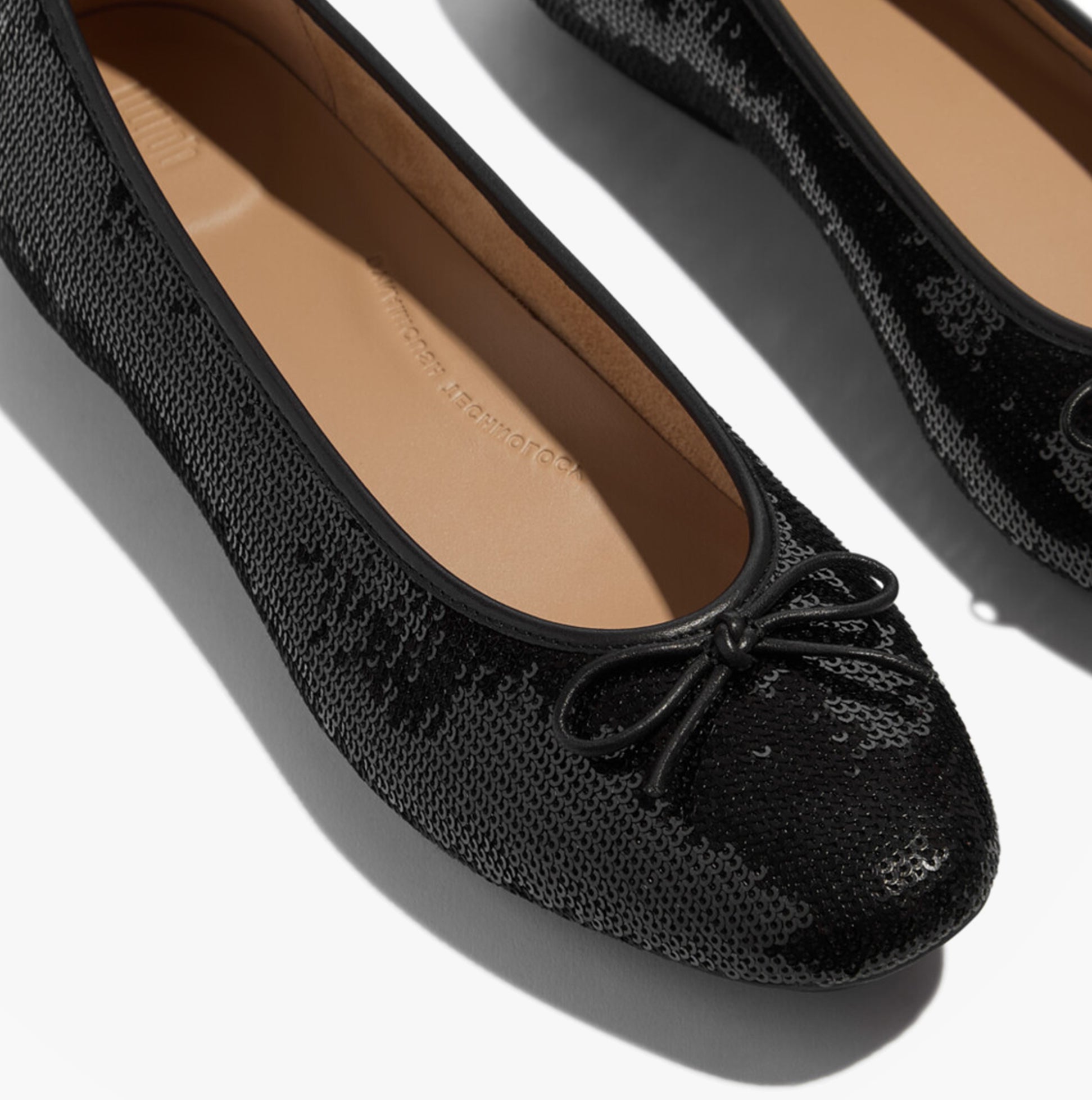 FitFlop DELICATO BOW SEQUIN BALLET Womens Ballet Black top detail view with sequins and bow.