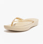 FitFlop IQUSHION Womens Flip Flops Gold side view, lightweight, slip-on design, EVA sole, summer footwear.
