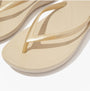 FitFlop IQUSHION Womens Flip Flops Gold detail view showcasing rubber upper and EVA sole.