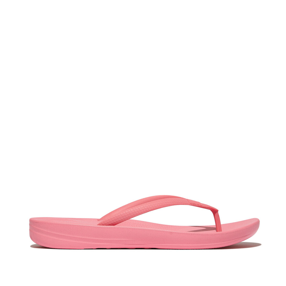 FitFlop IQUSHION ERGONOMIC Womens Flip Flops Geranium Pink side view showcasing lightweight design and rubber material.